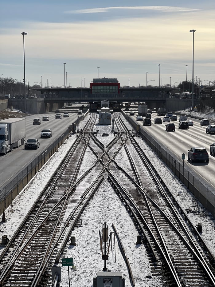 Chicago railway tracks and bridge walkways show snow cover