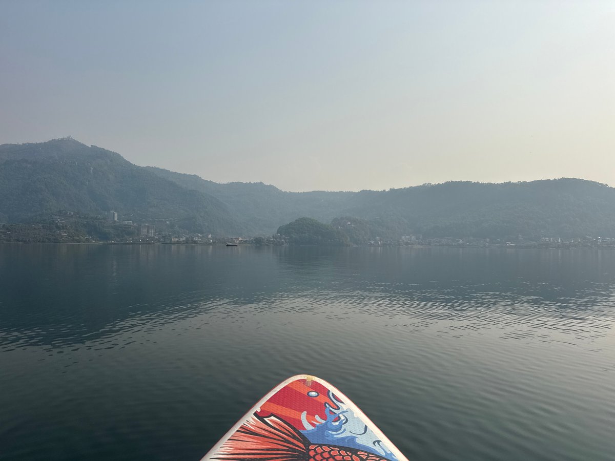 Early morning paddleboarding captured on Nepal's Phewa Lake