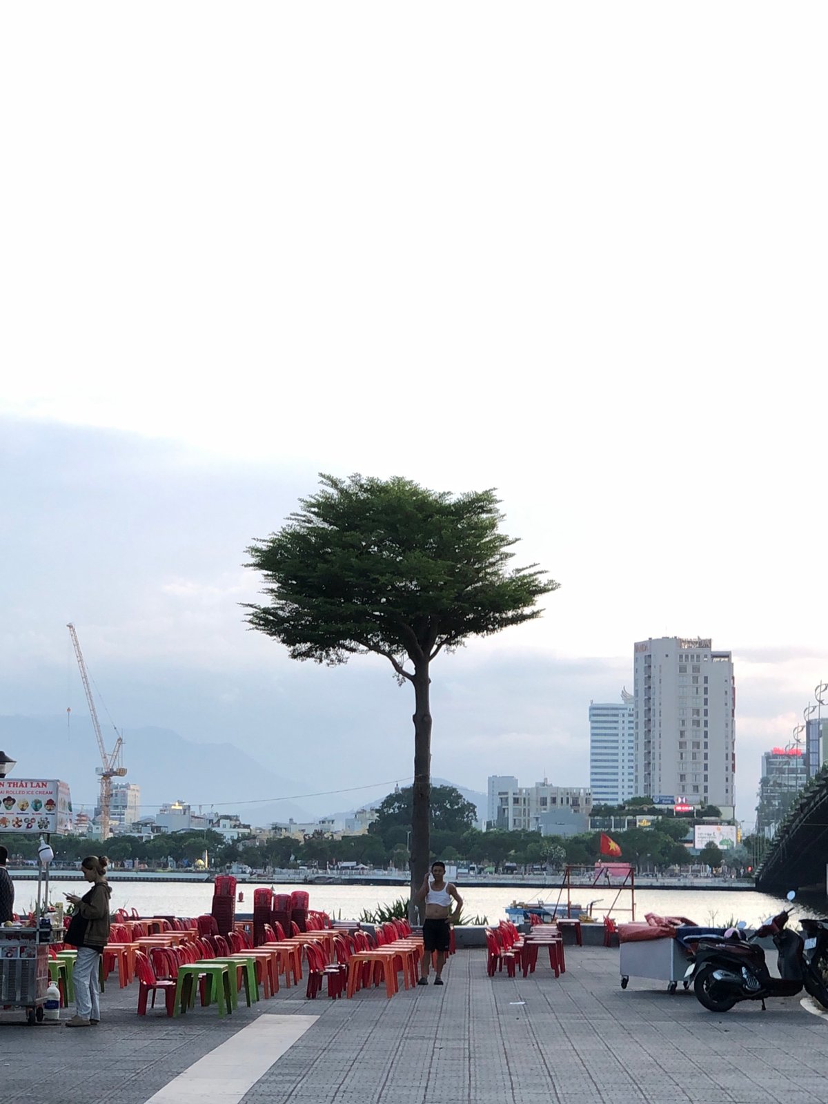 Da Nang riverside street life around the Dragon Bridge