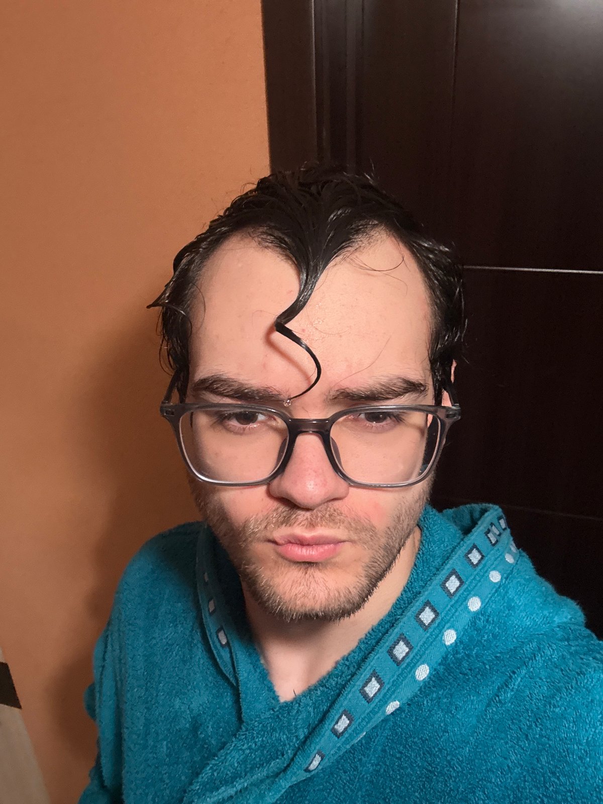 Man in bathrobe photographed in Blagoevgrad bathroom