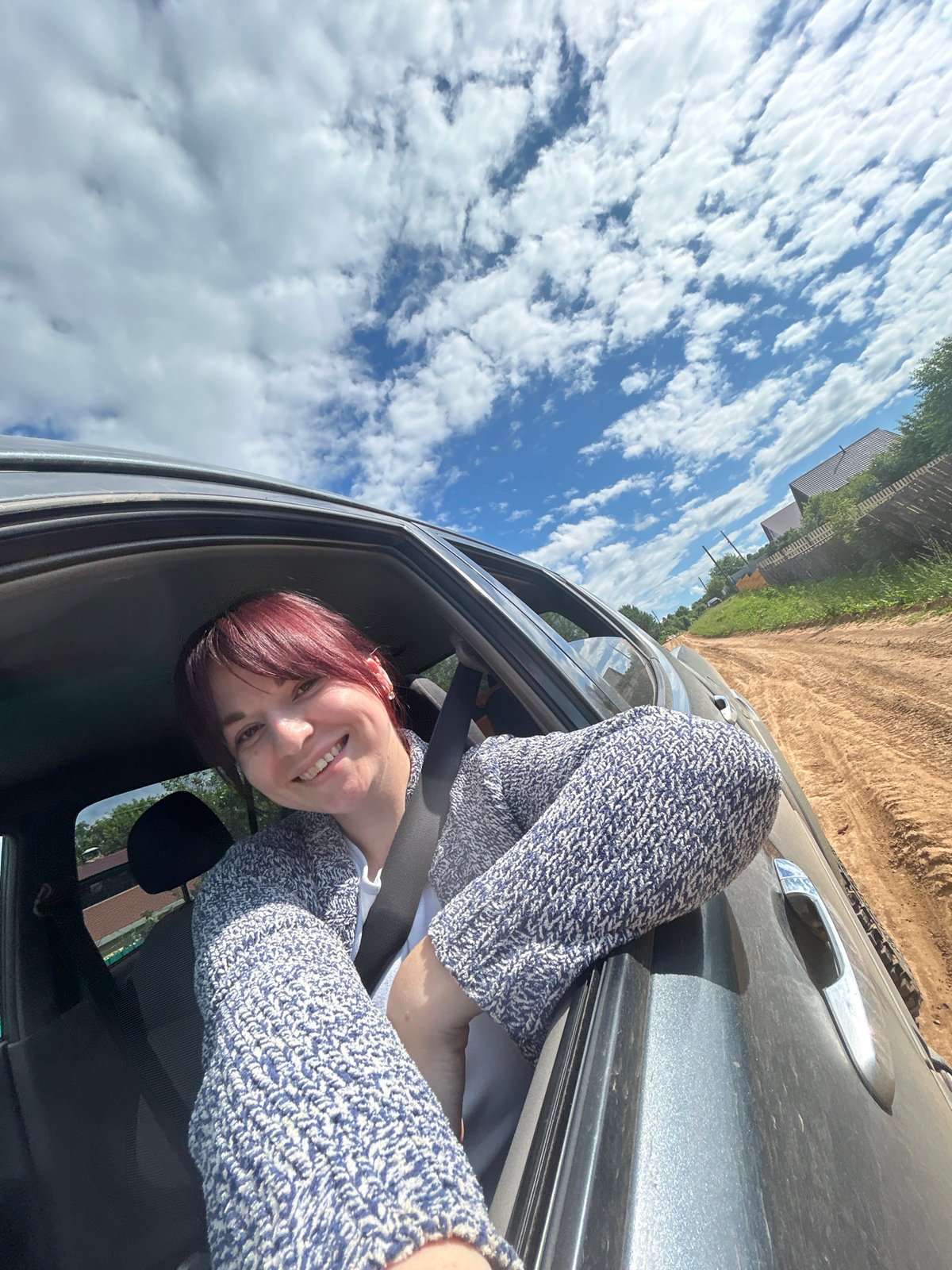 Roadside selfies in a quiet Russian village