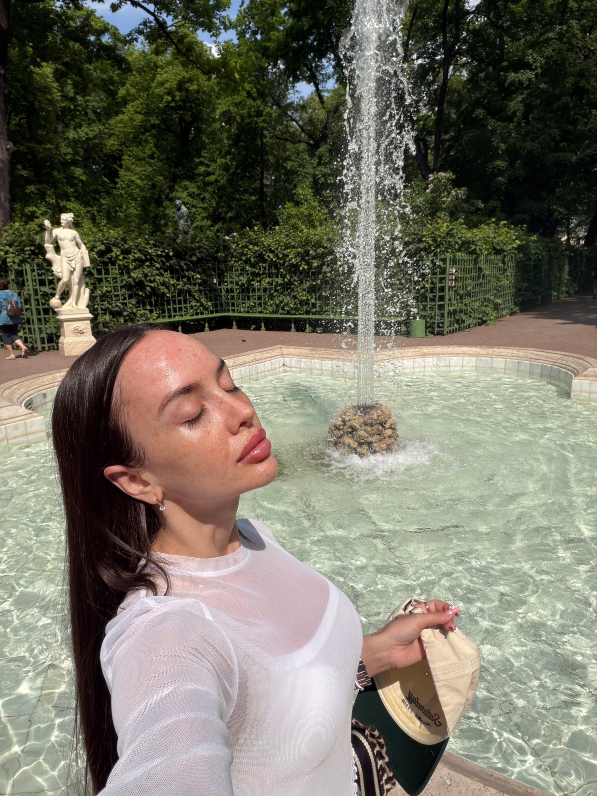 Summer morning activities documented at Saint Petersburg's Summer Garden