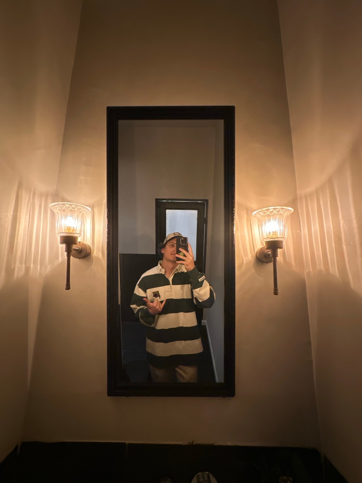 Tel-Aviv resident documents mirror selfie and street restaurant scene
