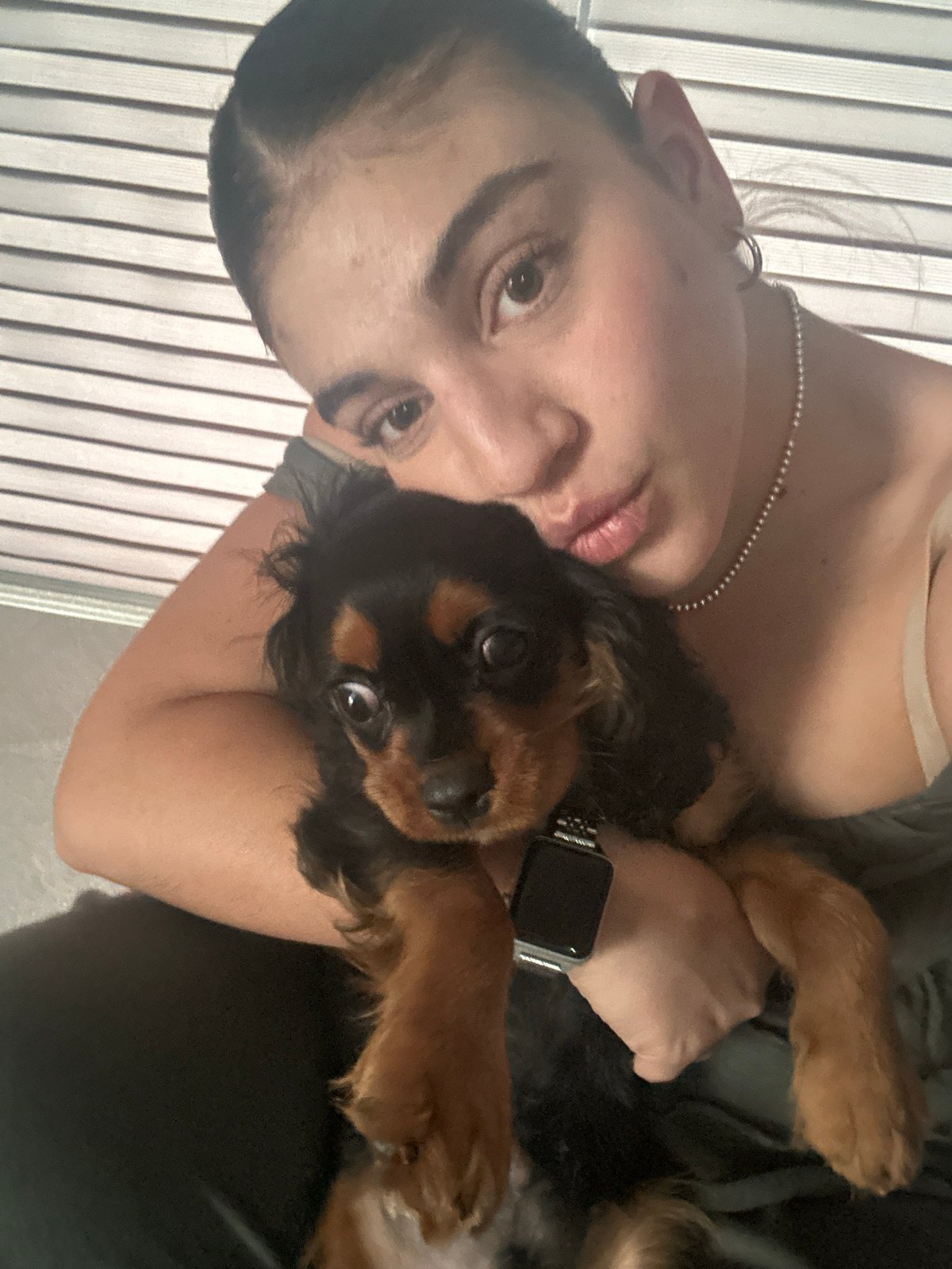 Woman takes selfie videos with puppy in Puebla