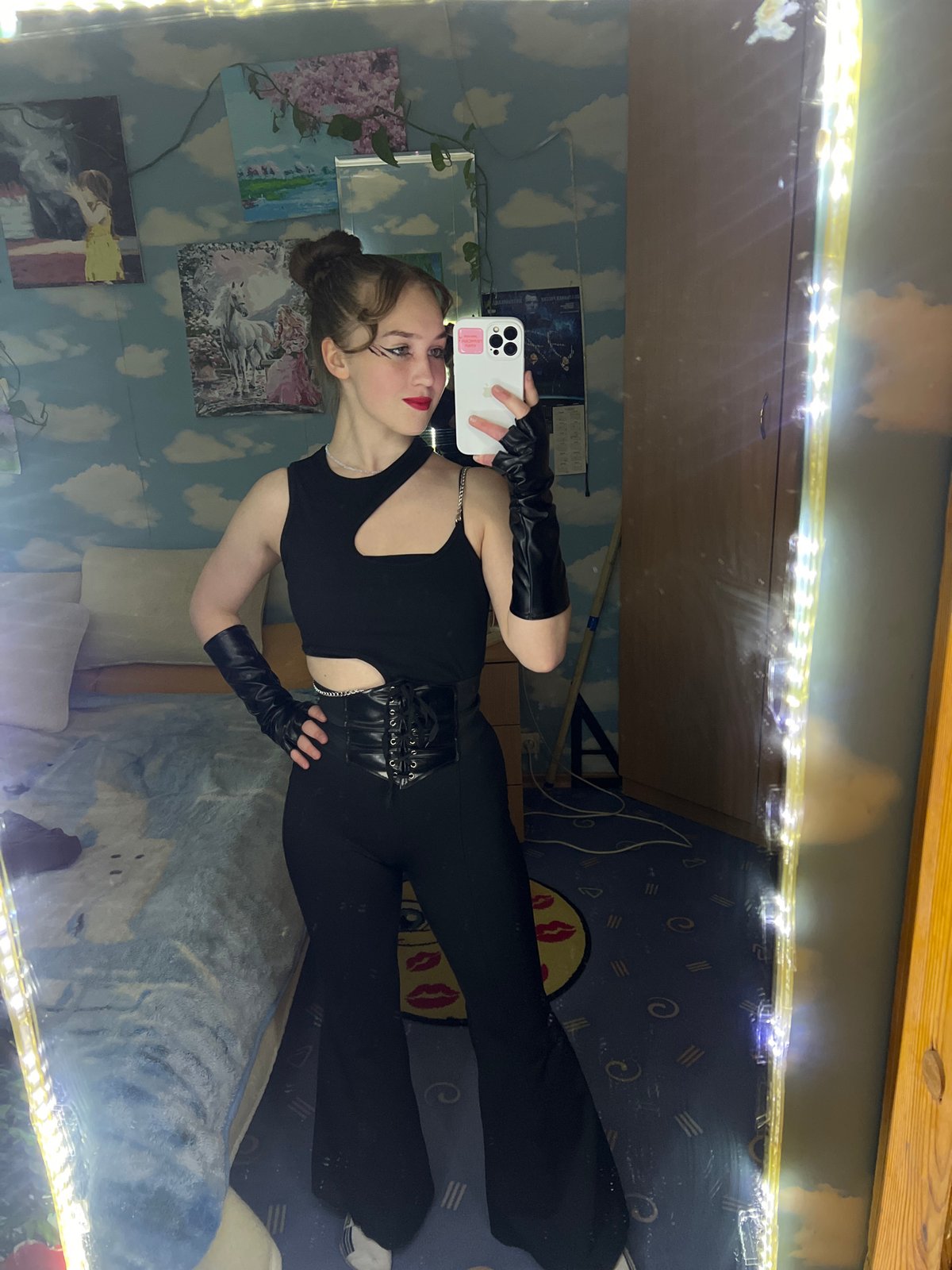 Afternoon snapshots capture mirror selfies, cloudy skies, urban views