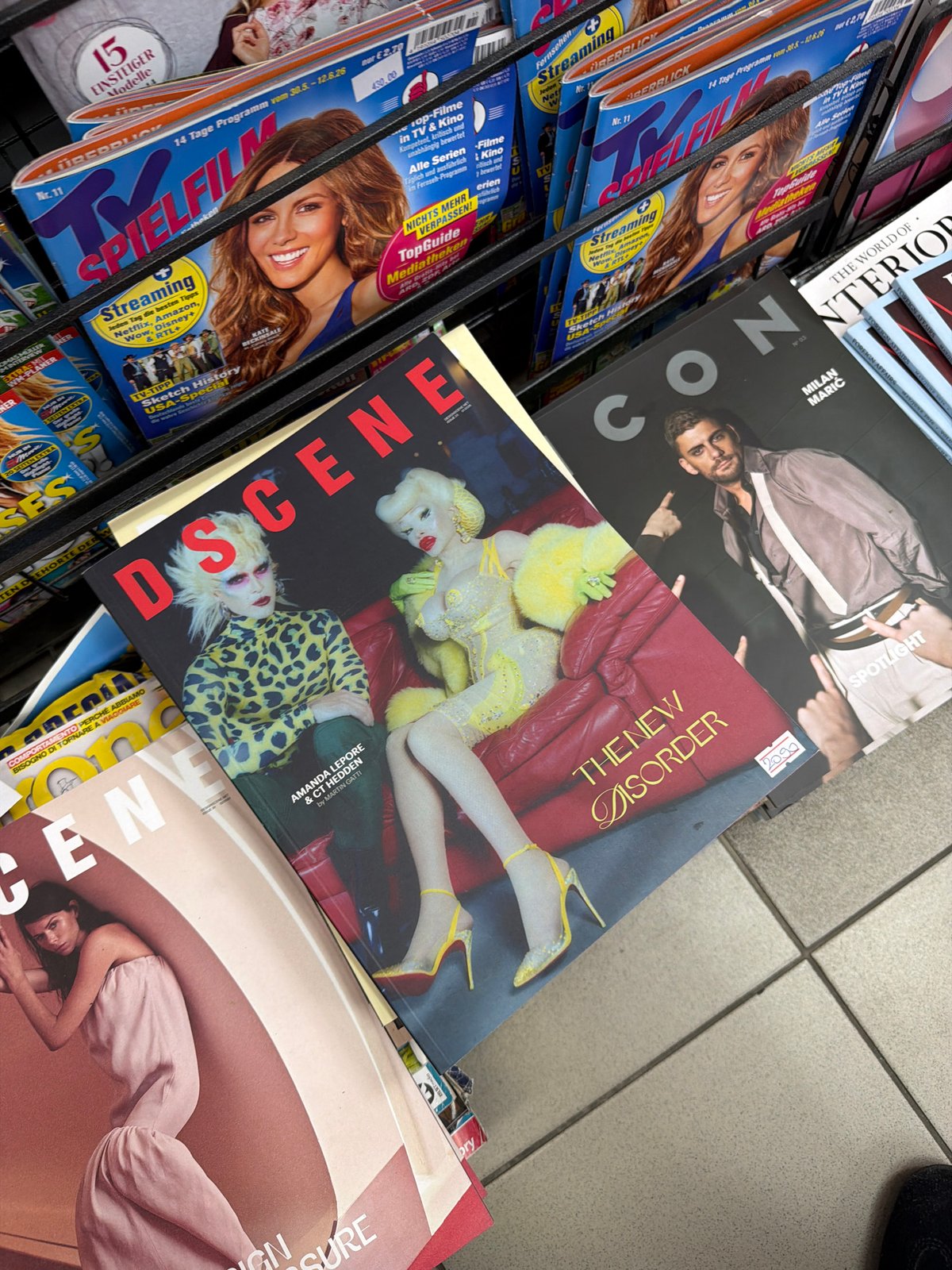 Magazine rack with international publications documented in Belgrade