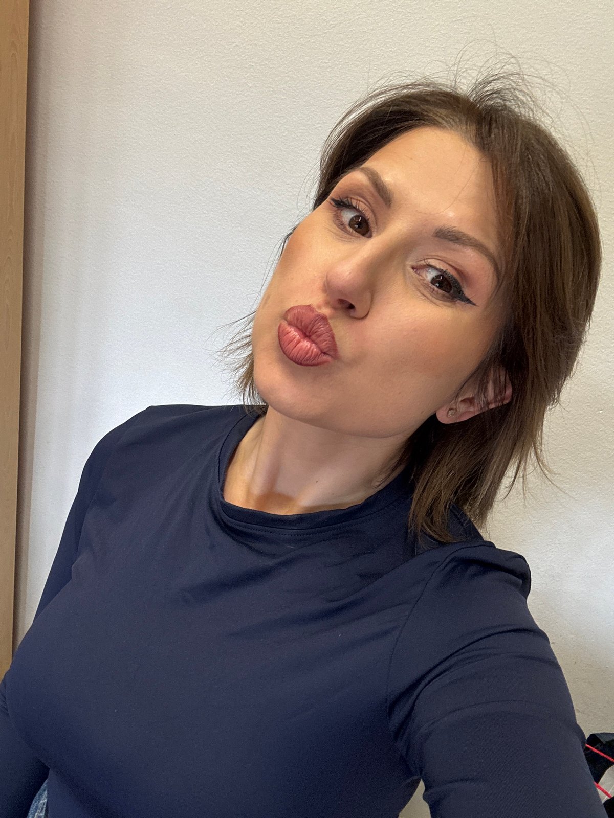 Woman documents morning moments with selfies, orchids, pizza in Sofia