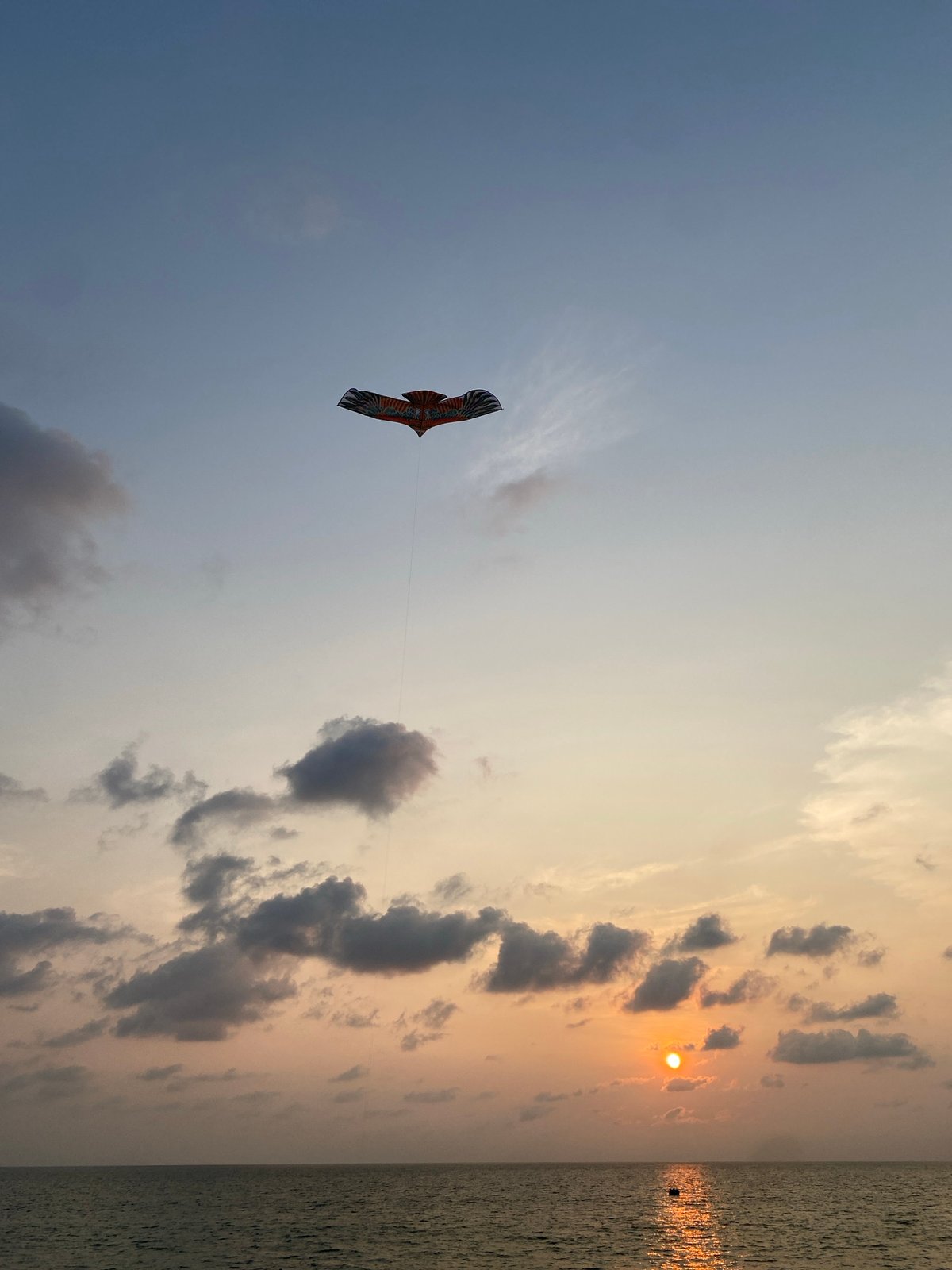 Sunset beach activities captured across Choeng Thale, Thailand waterfront