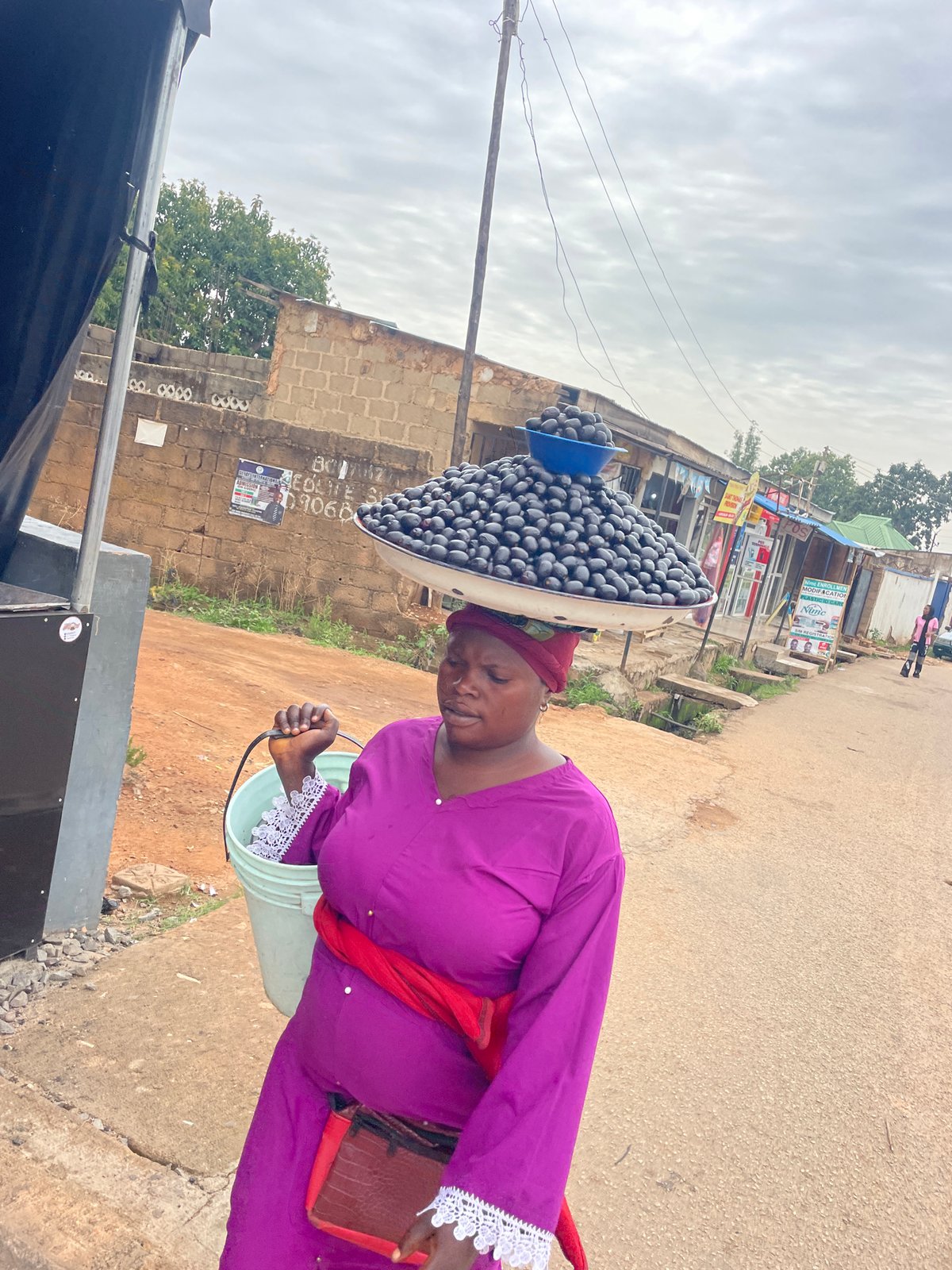 Street vendors conduct morning business in Jos, Nigeria