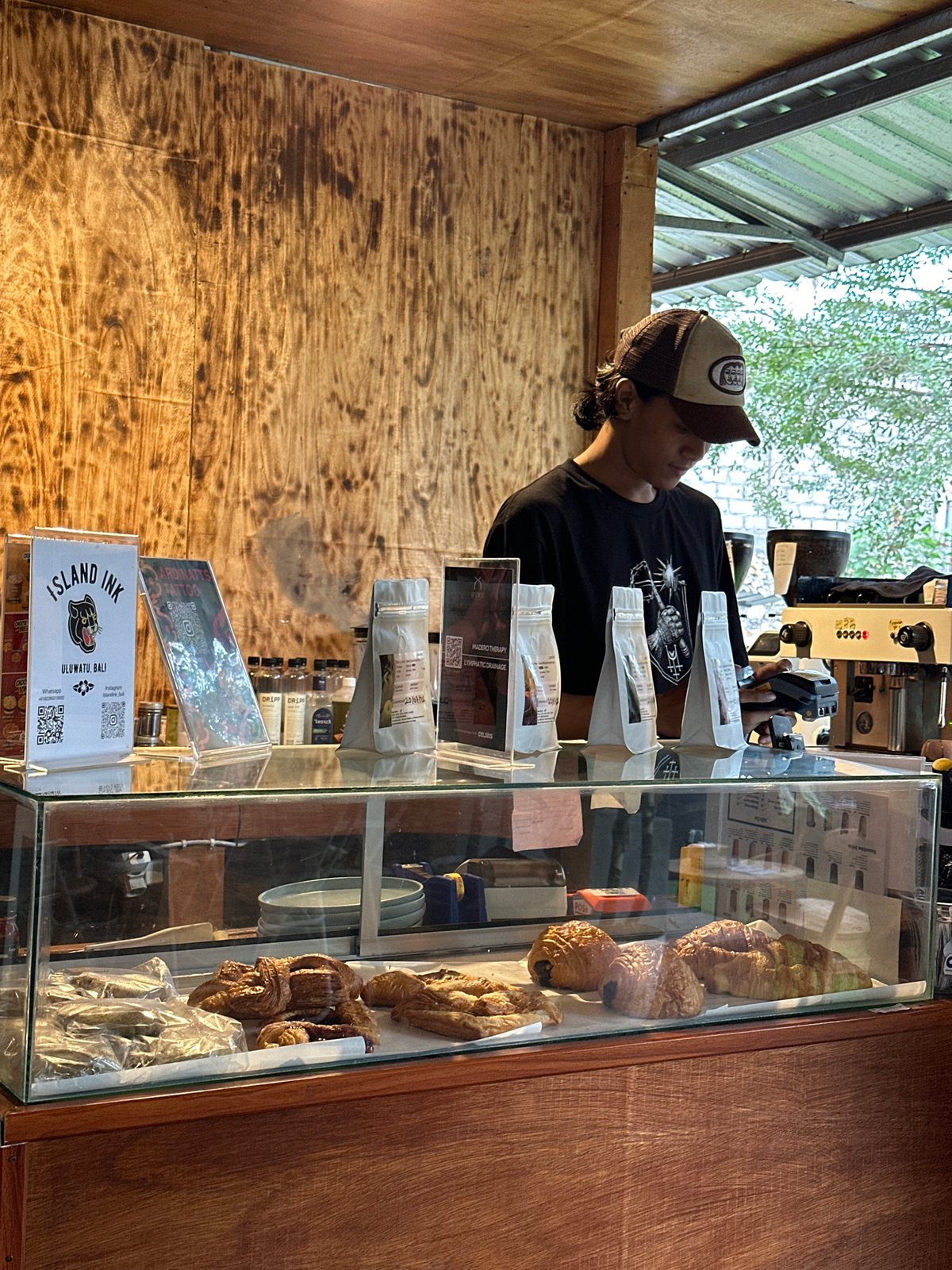 Inside a relaxed café-tattoo shop spot in Kuta Selatan