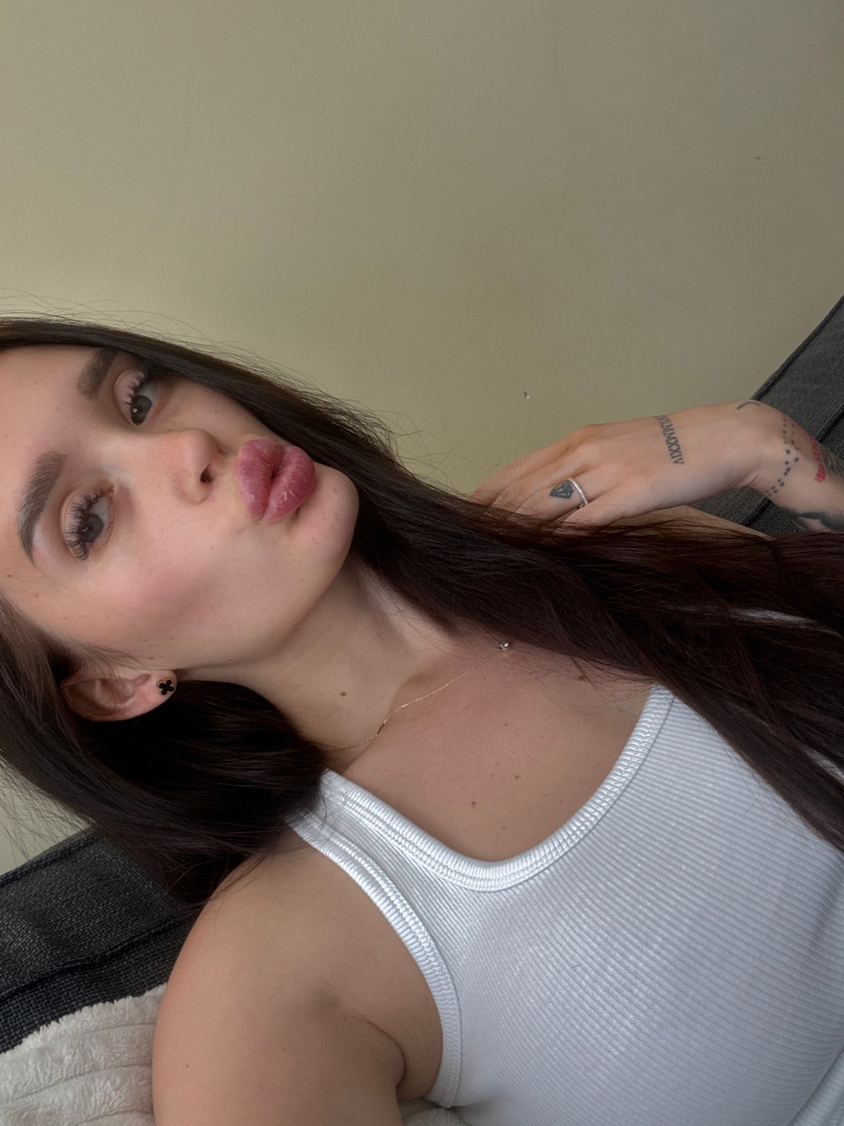 Woman photographed resting on couch in Sofia