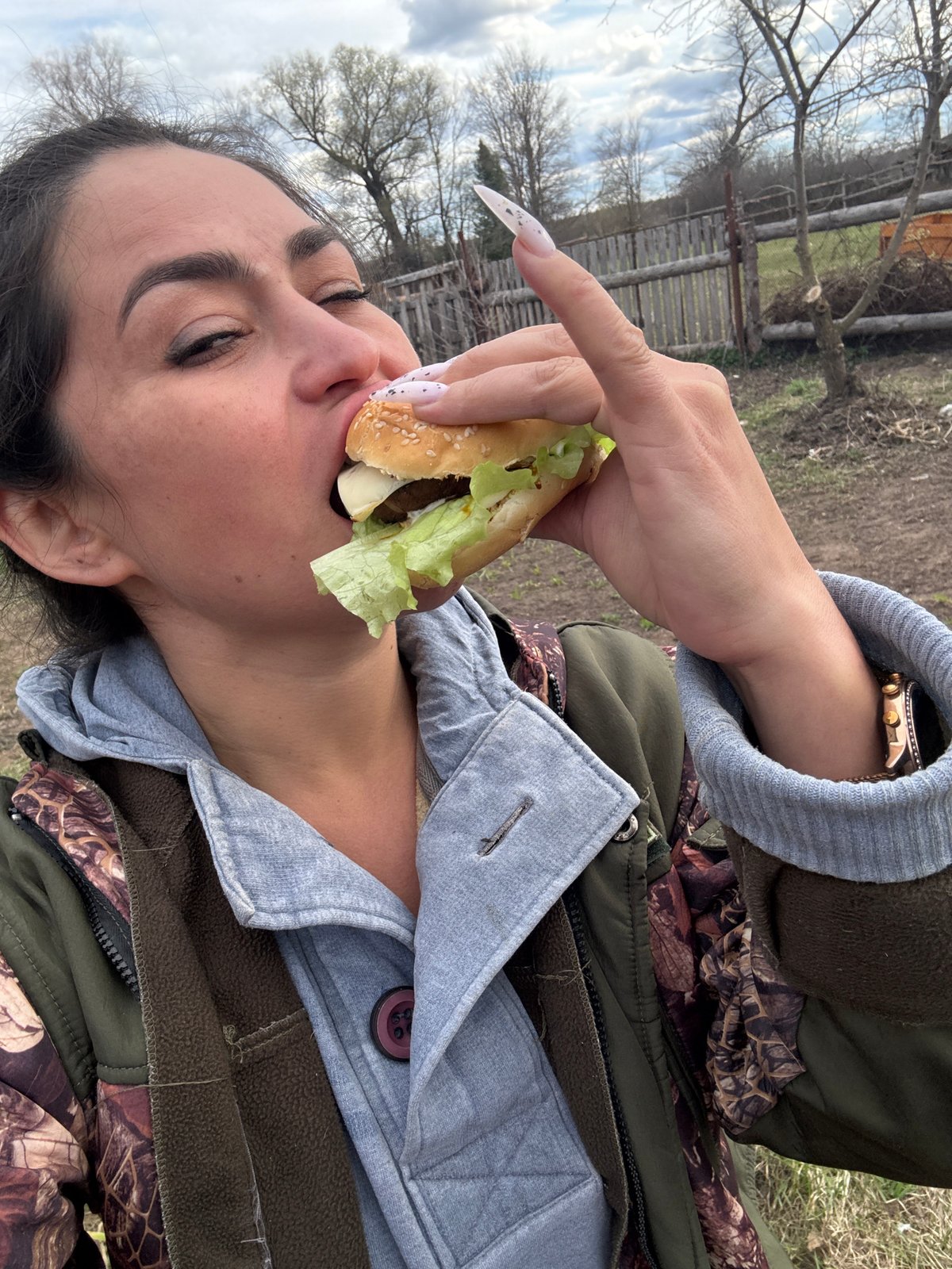 Casual backyard barbecue gathering documented in Кемуль, Russia