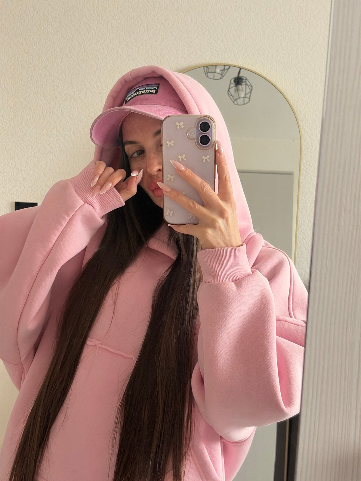Mirror selfie captured in pink outfit, Saint Petersburg