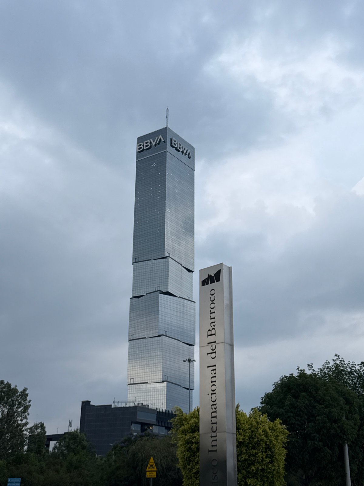 Modern towers photographed in Puebla metro area under overcast skies