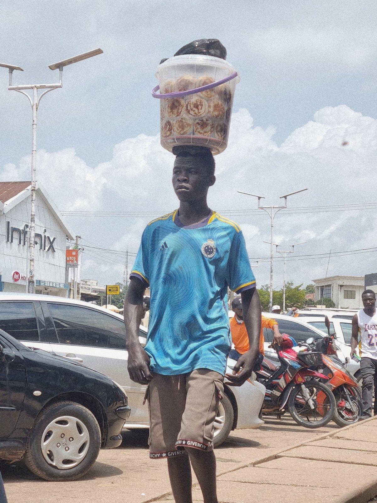 Street vendors and foot traffic in Jos, Nigeria