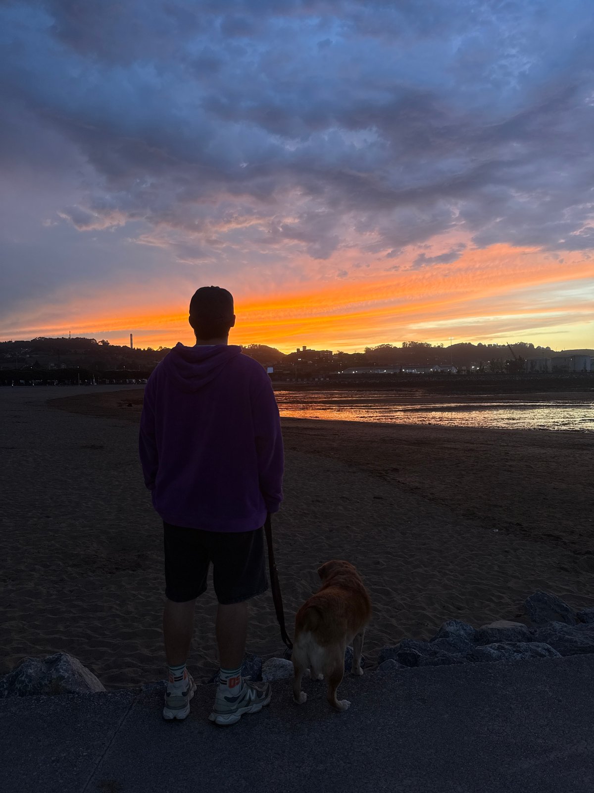 Sunset dog walk at El Arbeyal beach, Gijón
