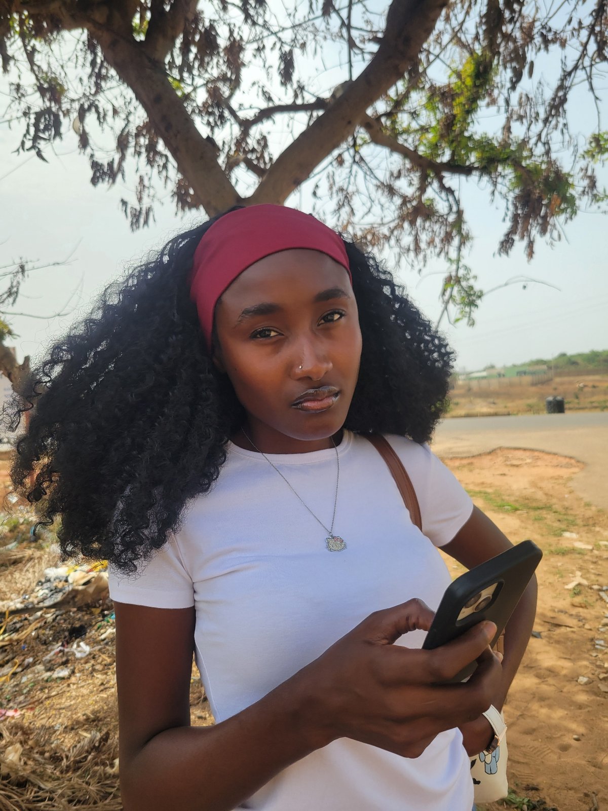 Woman photographed taking selfies in Jos, Nigeria
