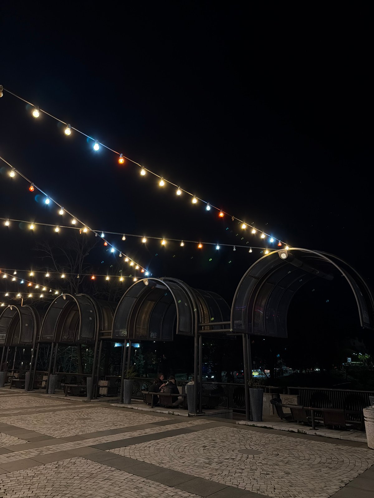 Colored lights illuminate nighttime public space in Blagoevgrad, Bulgaria