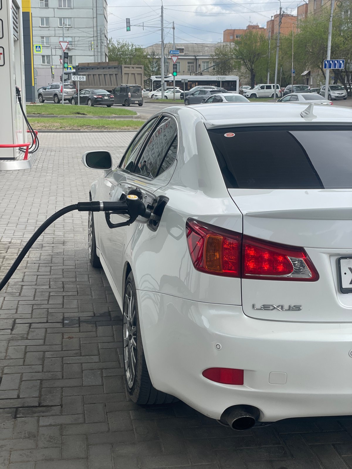 White Lexus refueled at Krasnoyarsk gas station