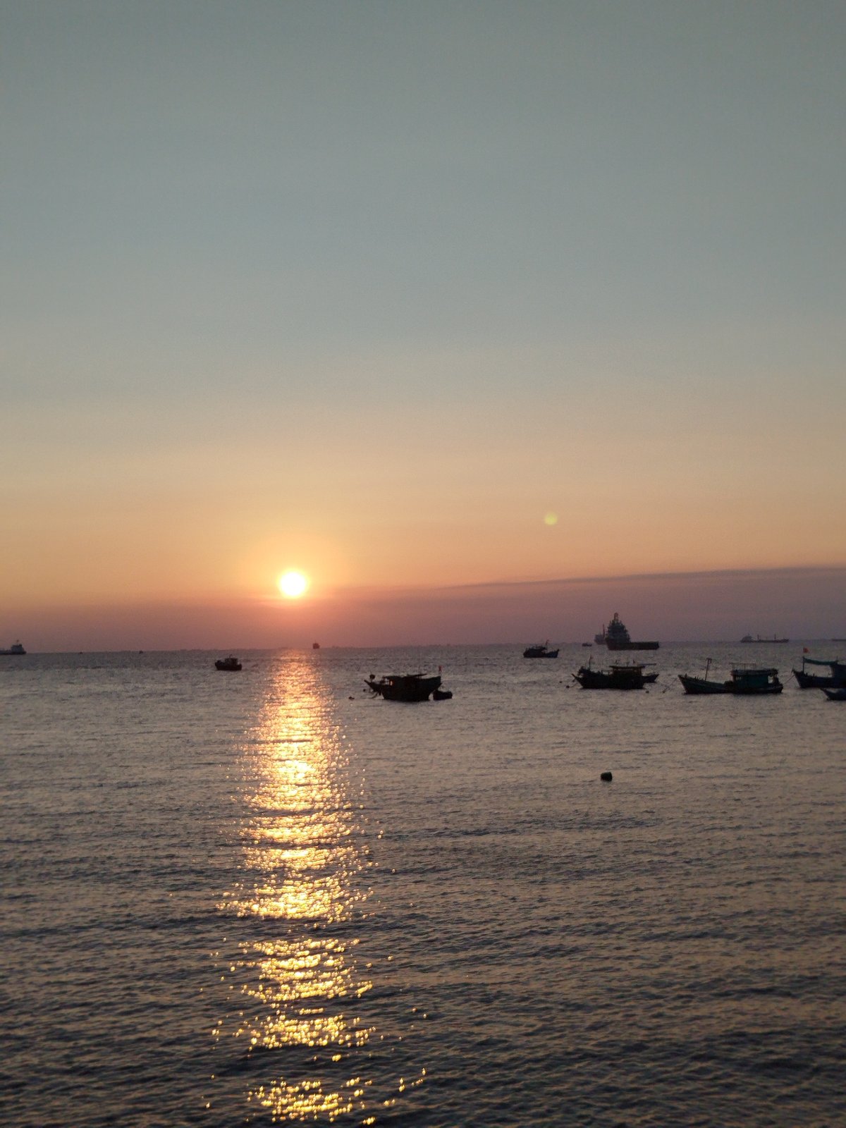 Mixed coastal activities and debris observed in Ho Chi Minh City