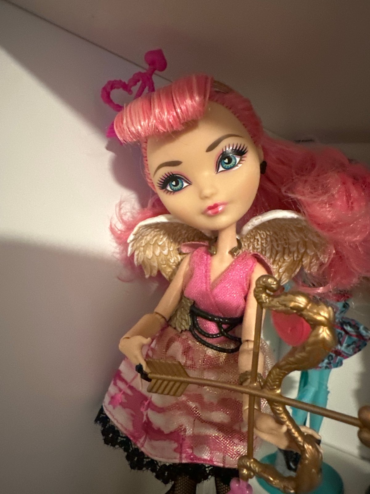 Close-up shots of toys, dolls, figurines, and flowers