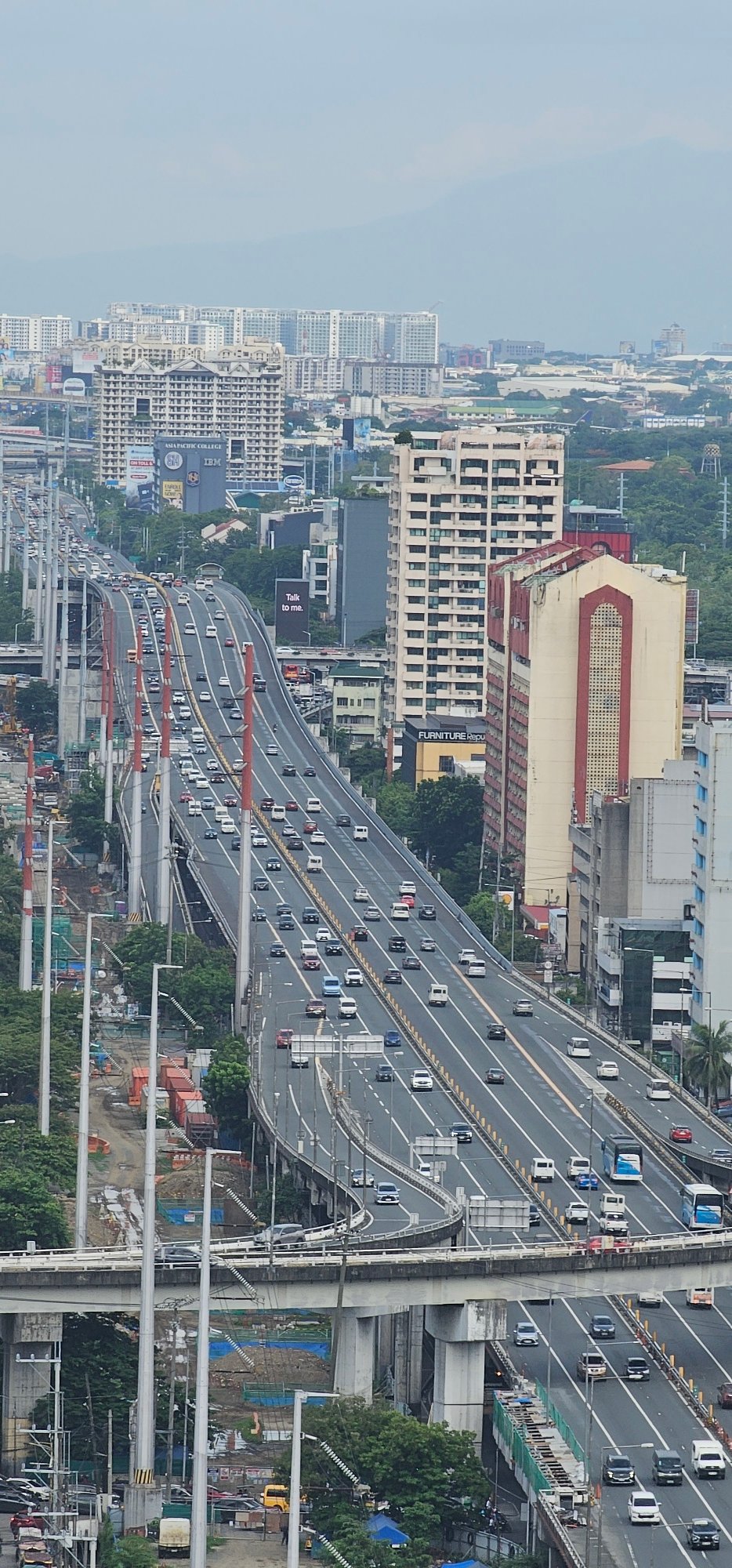 Makati traffic and urban street scenes on a hazy morning