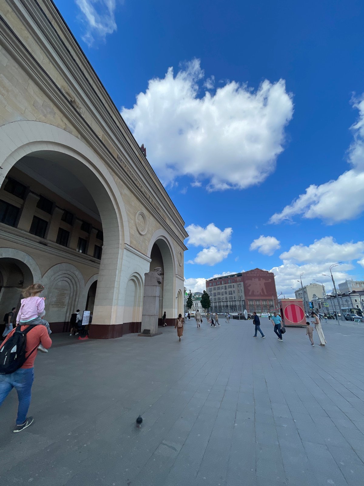 Moscow street and metro scenes on a bright summer morning