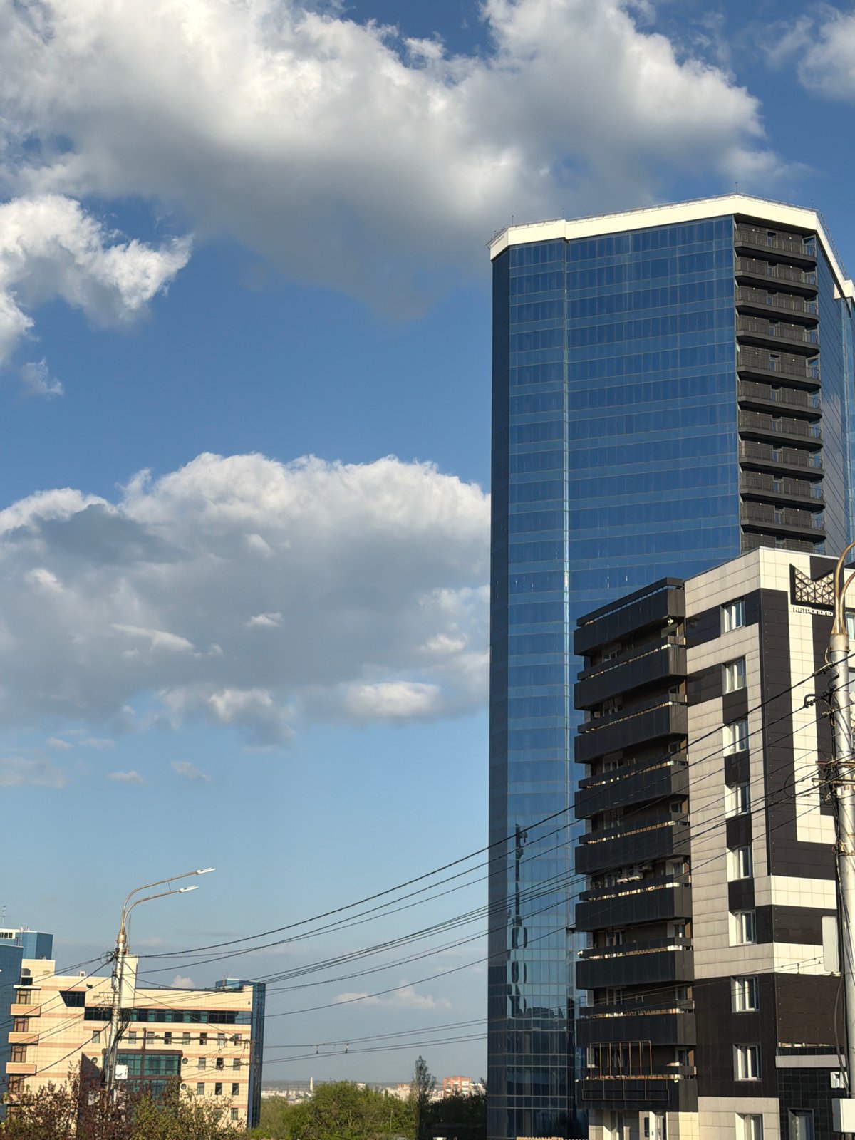Krasnoyarsk cityscape and regional museum photographed simultaneously