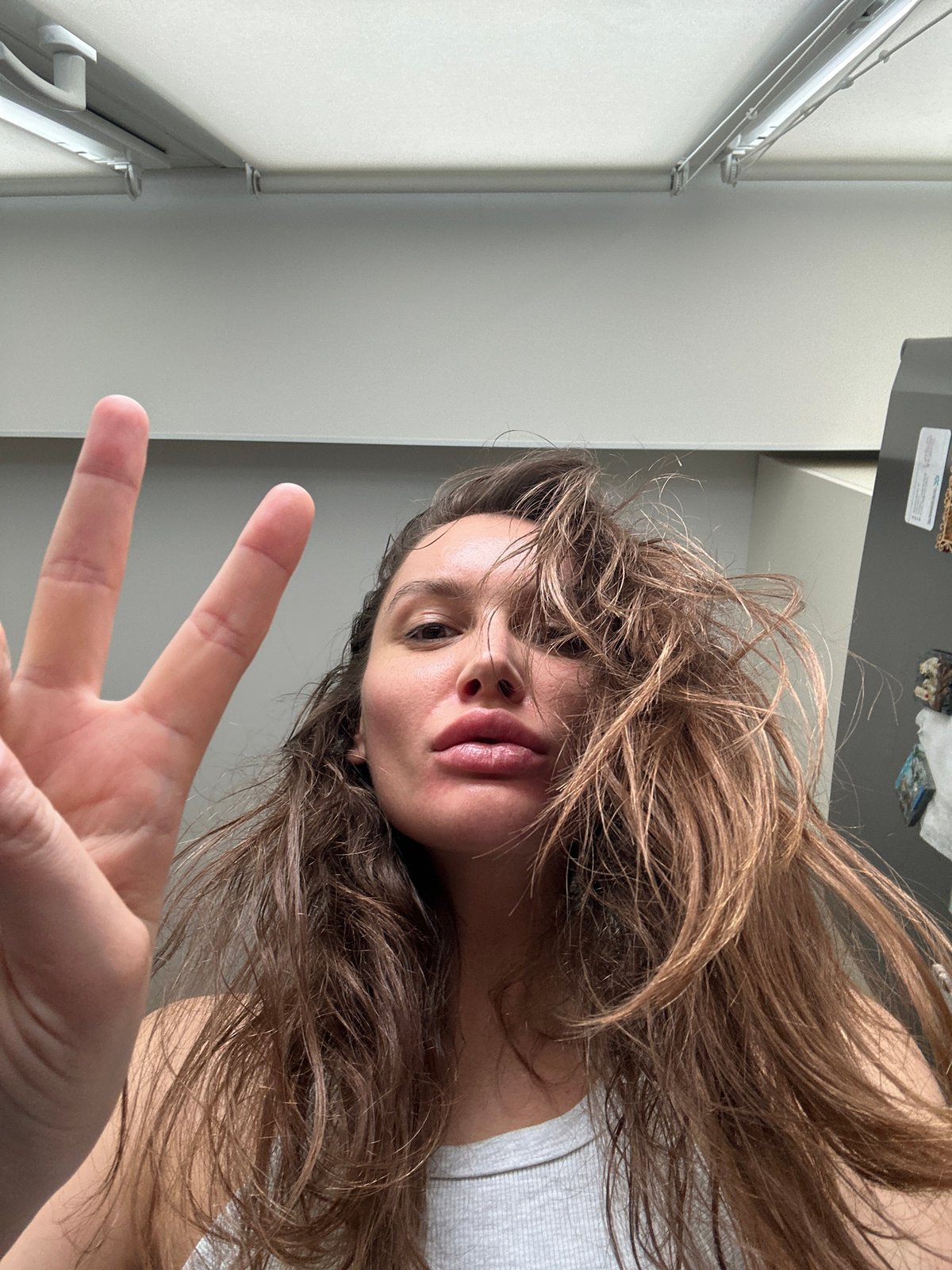 Woman takes indoor selfie in Moscow
