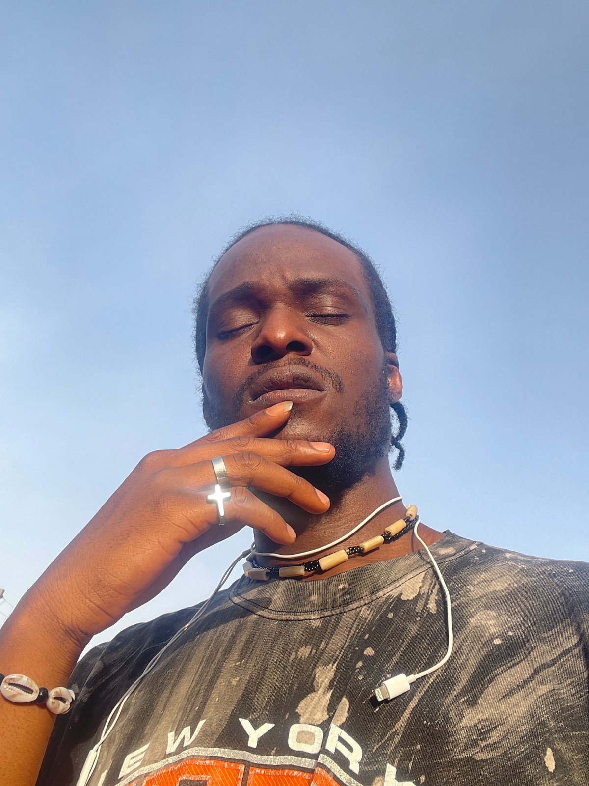 Man photographed in early morning moments in Jos, Nigeria