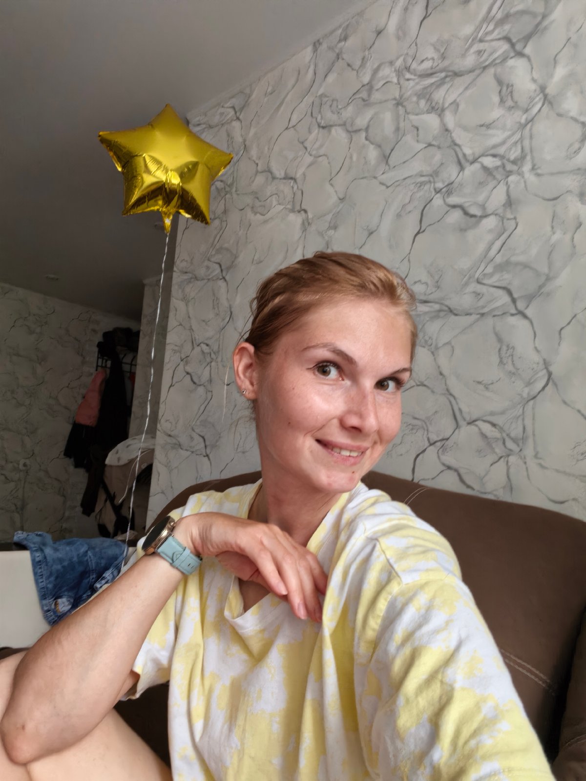 Couch selfies at home in Sterlitamak, one with a baby