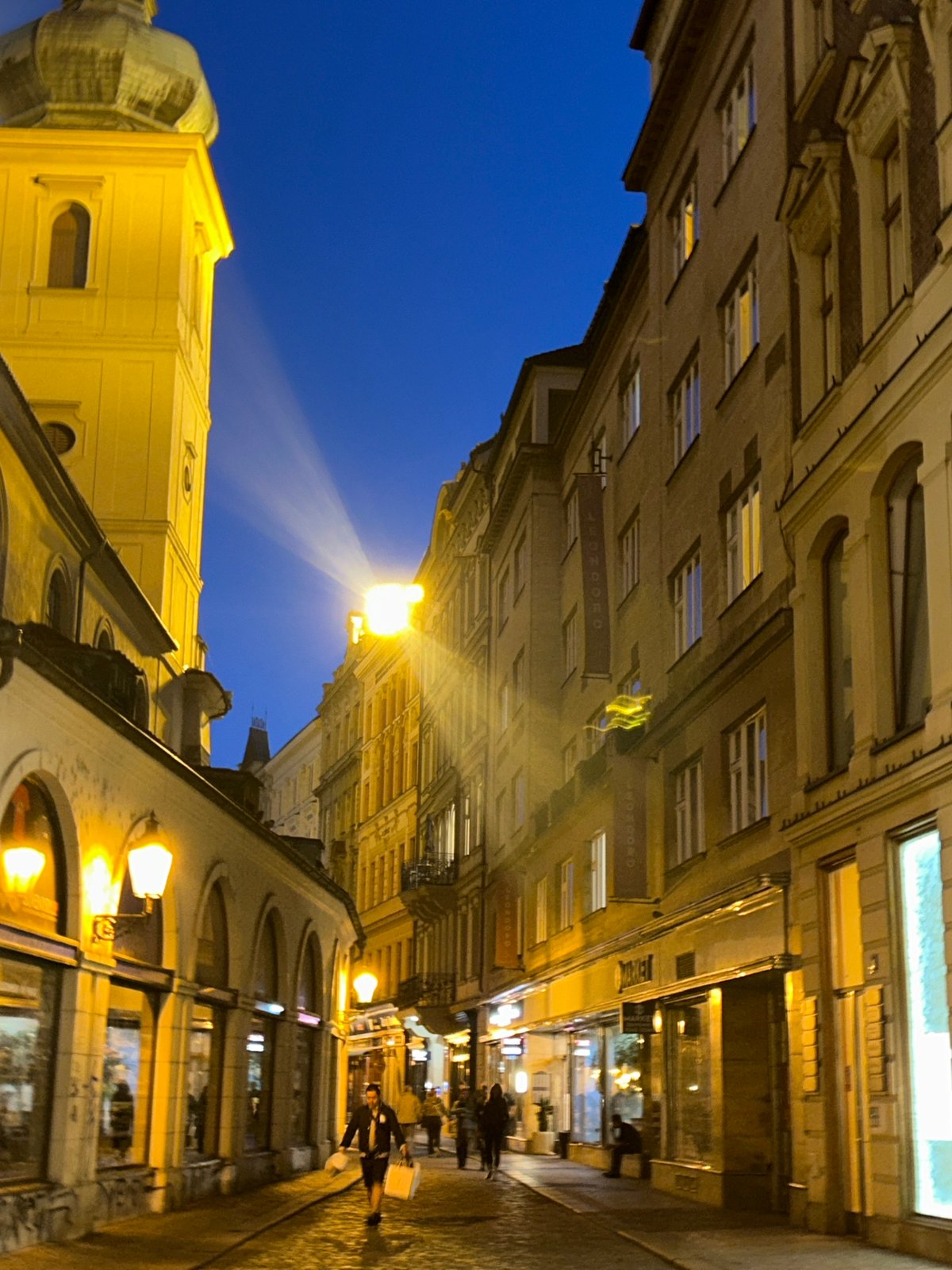 Evening architectural tour documented through Prague's historic streets