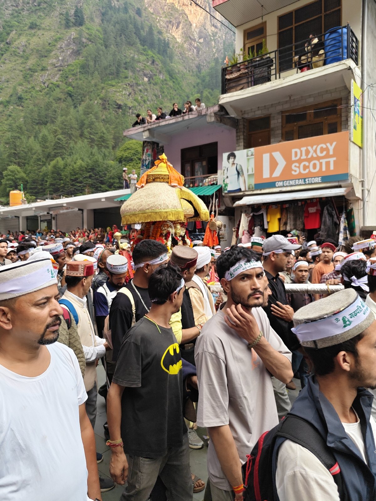 Religious procession with traditional caps fills Manikaran streets