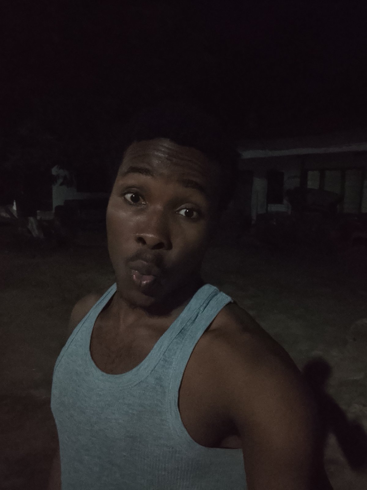 Late-night lighter flames and selfies in Orodo, Nigeria