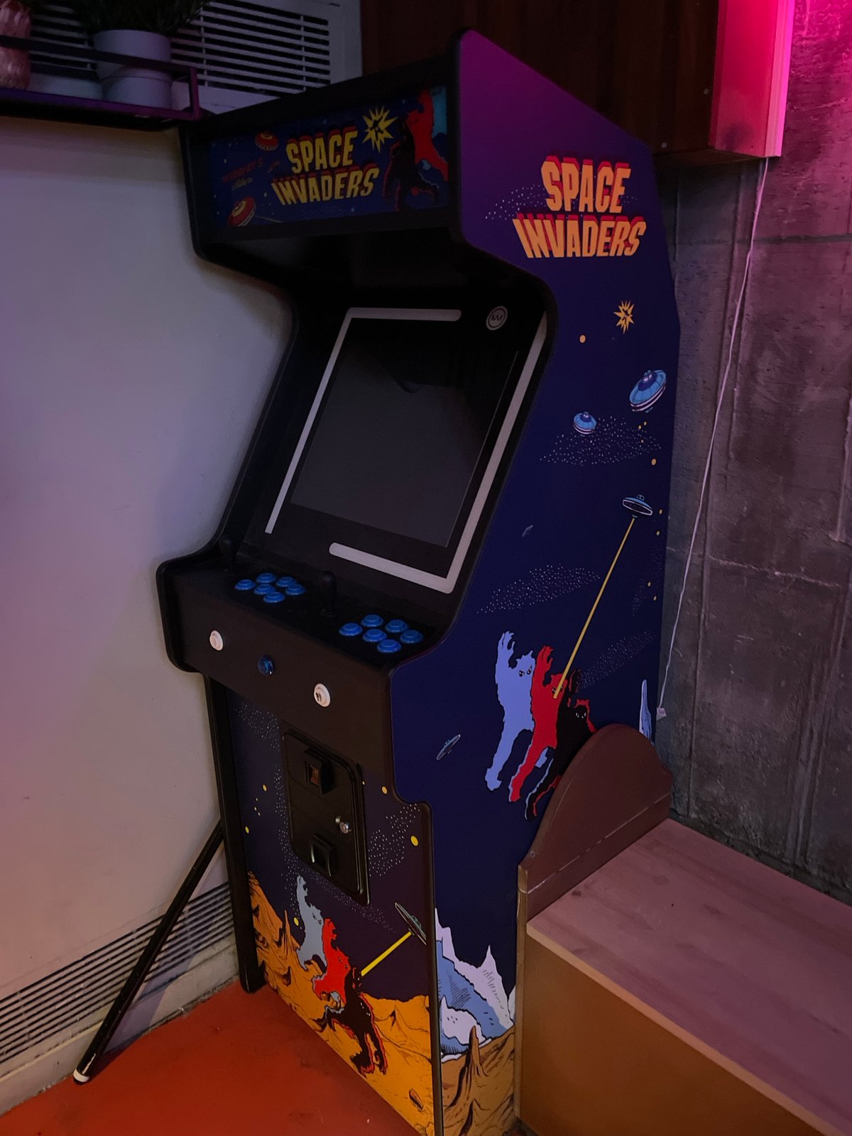 Barcelona bar showcases international flags and arcade games