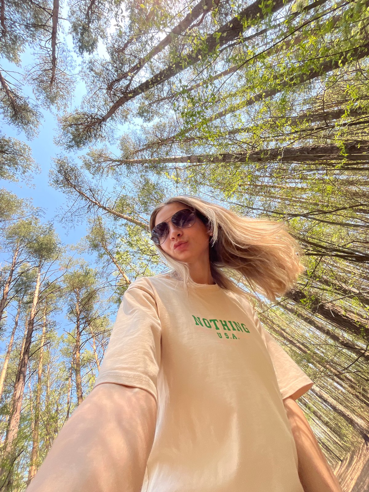 Couple photographs forest outing in Chaikovsky, Russia