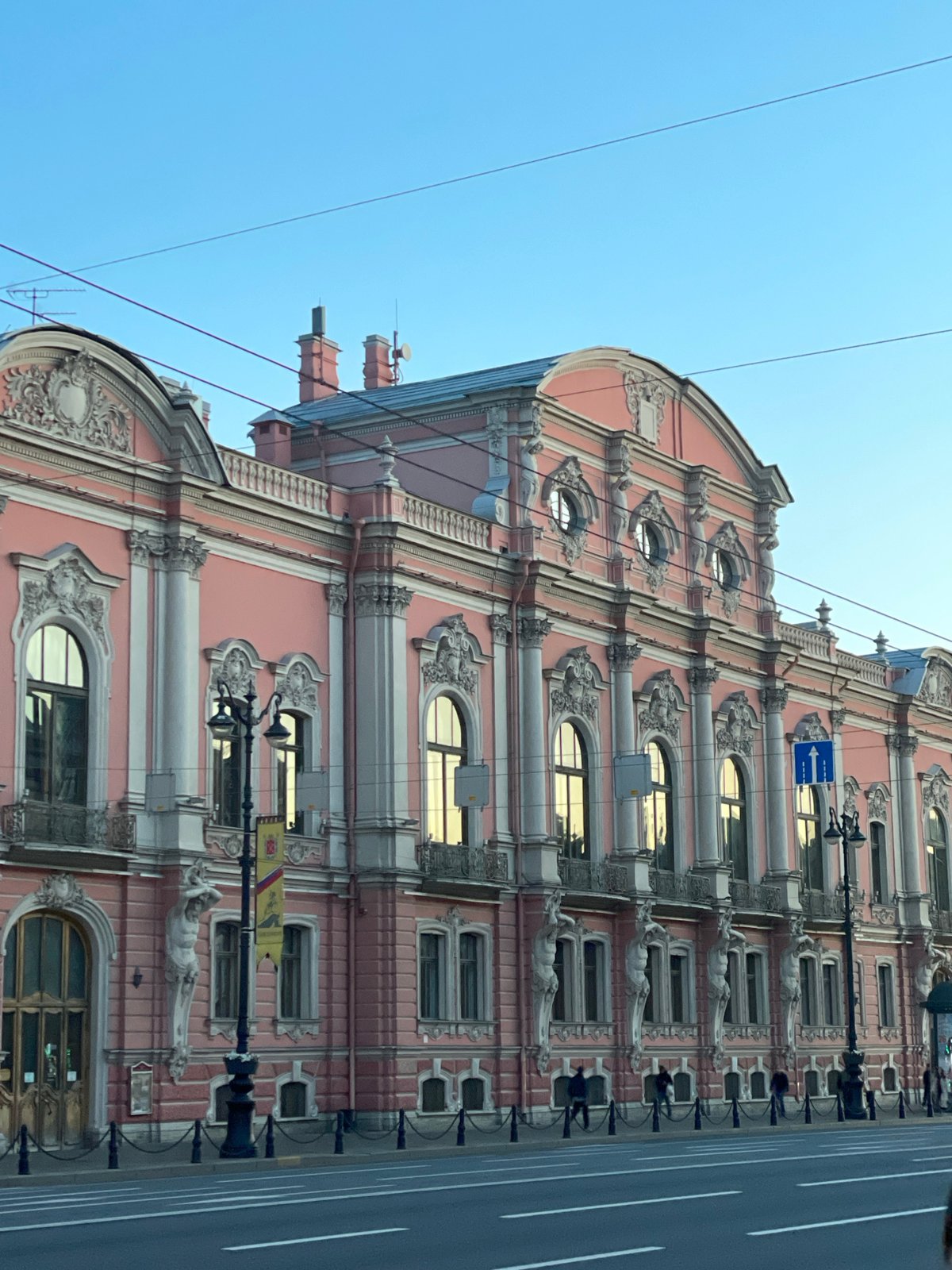 Historic pink building photographed from multiple angles in Saint Petersburg