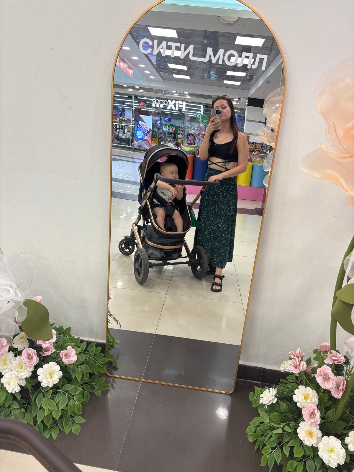 Mall stroll with a baby in Naberezhnye Chelny, Russia