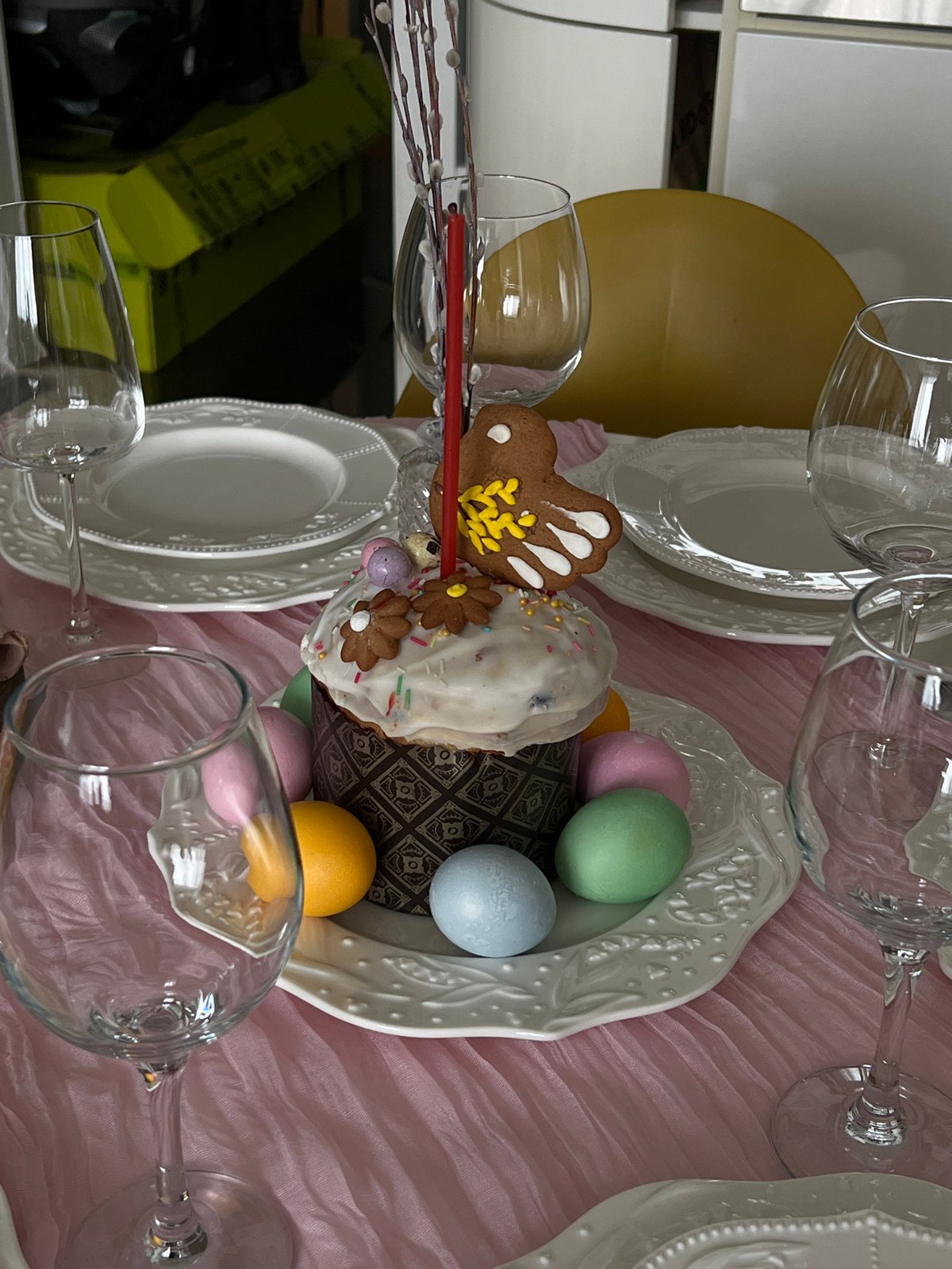 Easter celebration table with scattered wine glasses observed in Khimki