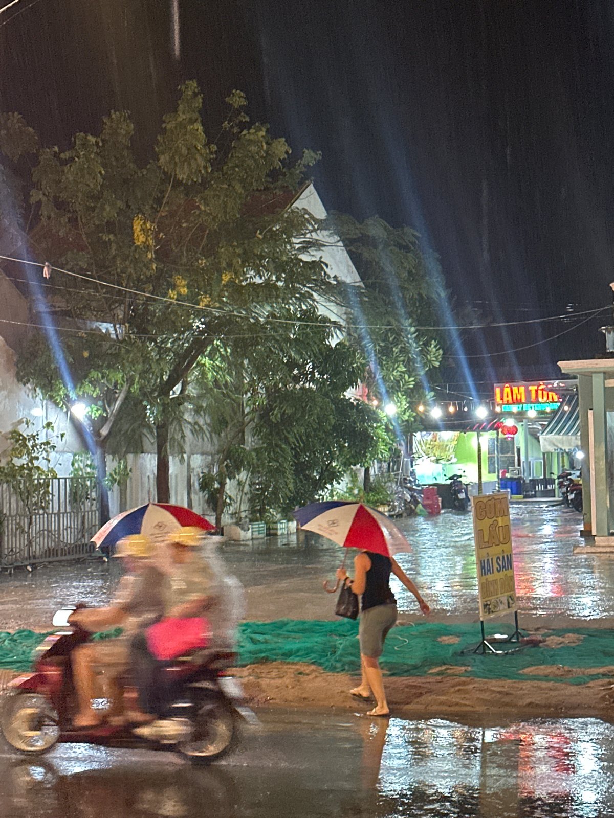Rain-soaked streets observed in Phu Thuy Ward, Vietnam