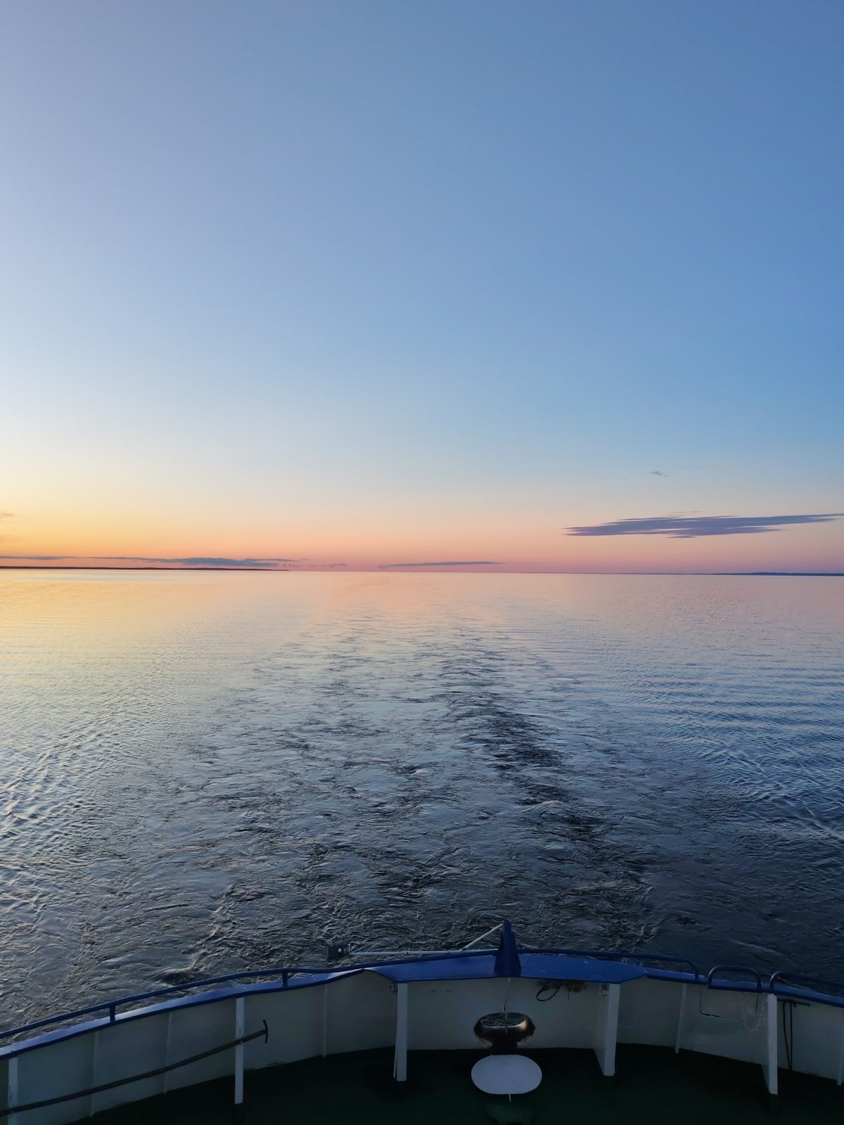 Sunset boat journey captured on Russian waters