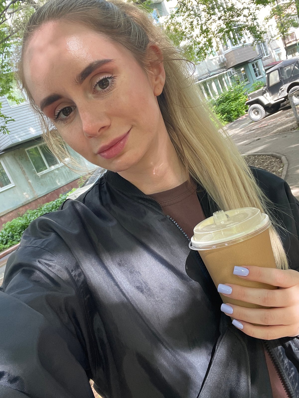 Woman spends evening coffee break and driving practice in Vladivostok