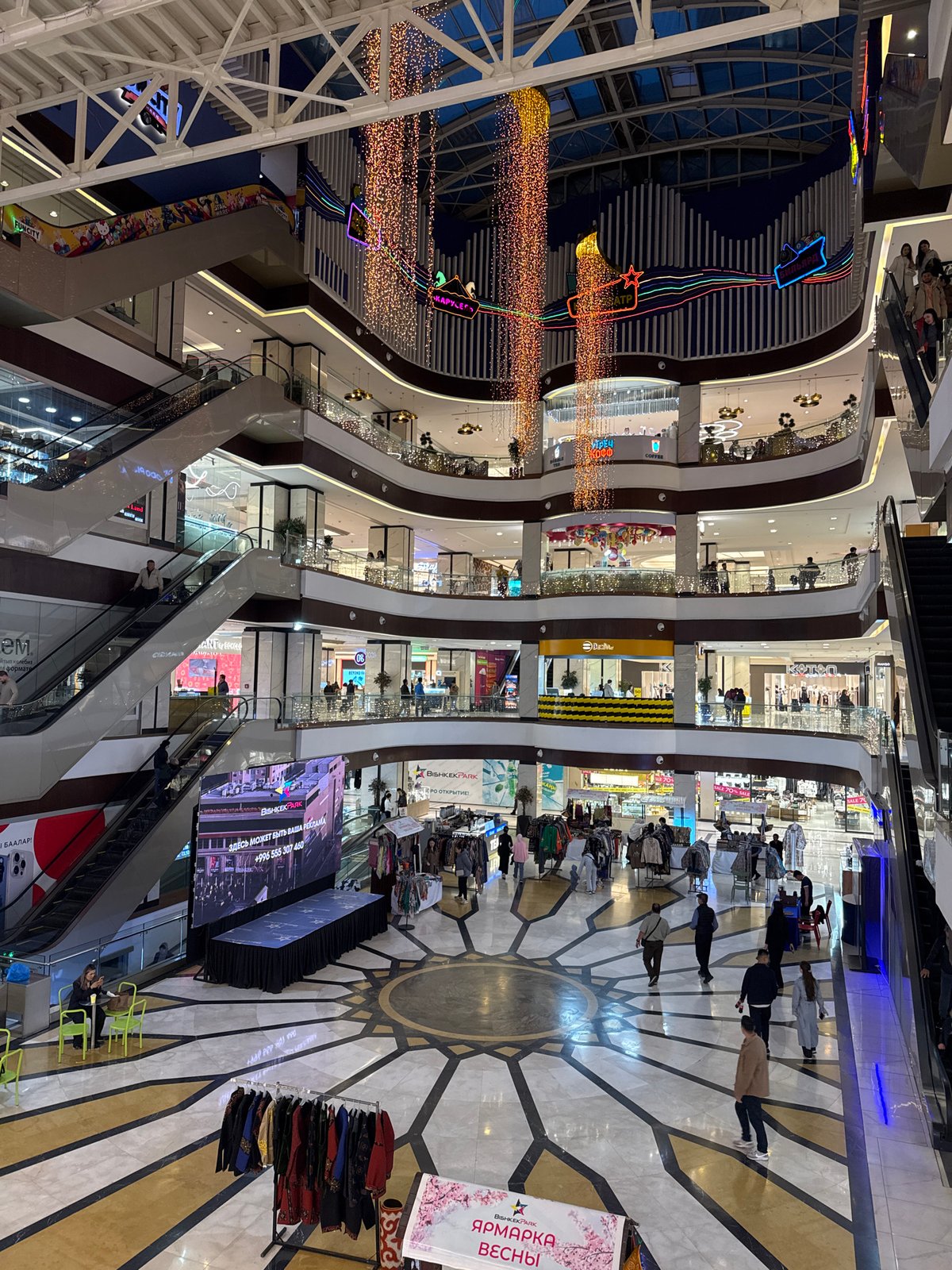 Ordinary shopping mall activities documented in Bishkek, Kyrgyzstan