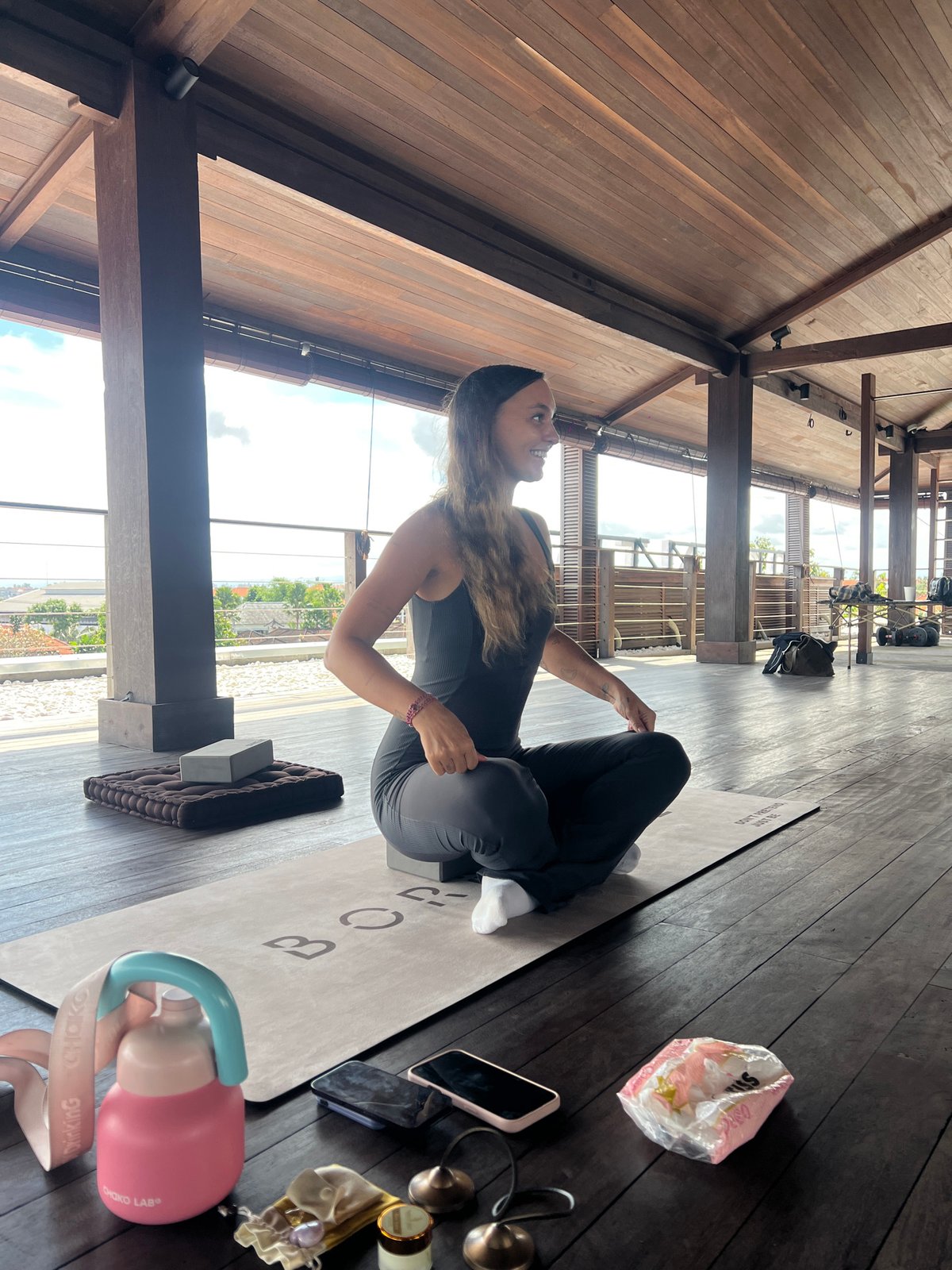 Woman practices early morning yoga in Mengwi, Indonesia