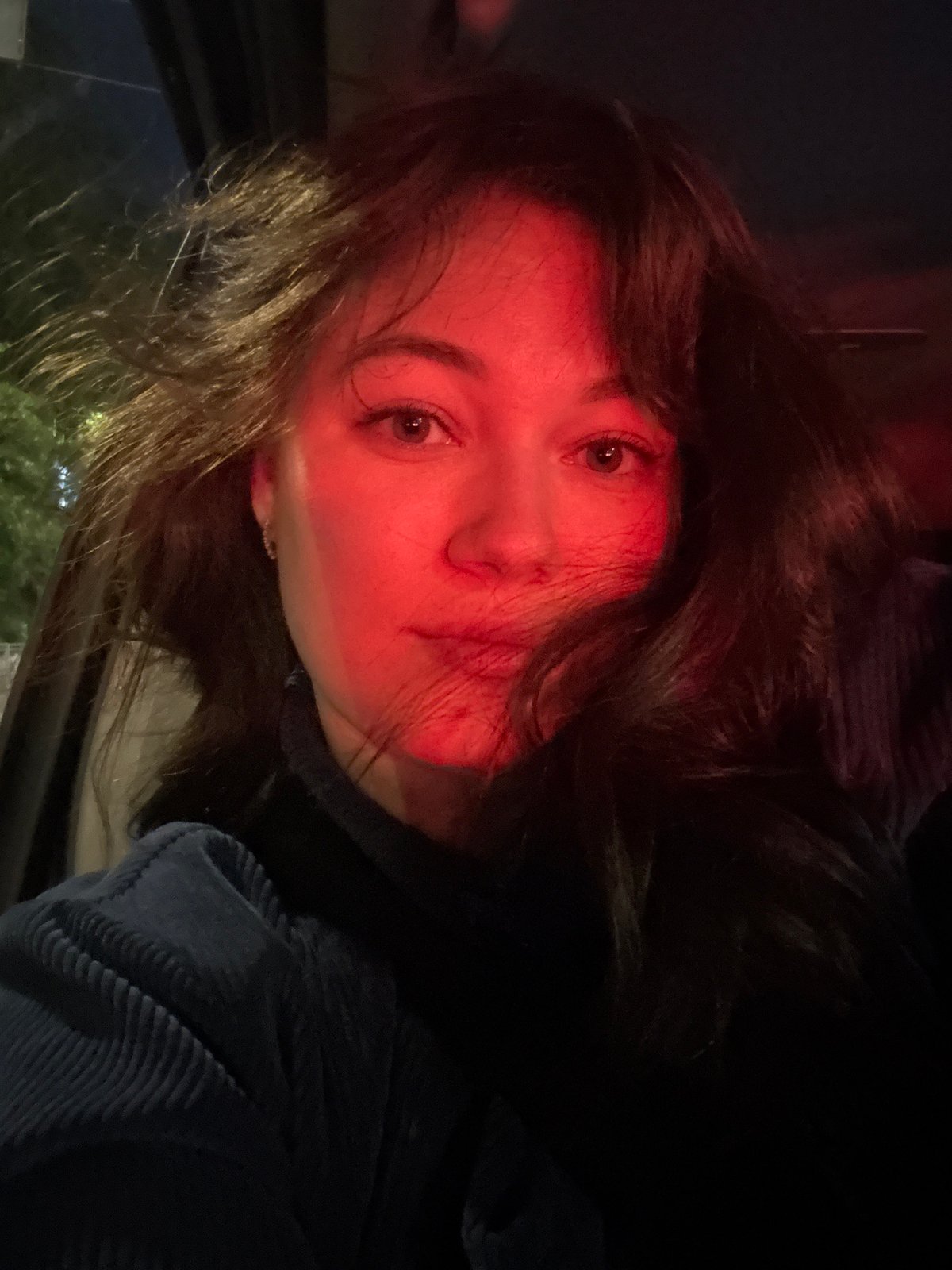 Woman takes nighttime selfies during car journey in Perm