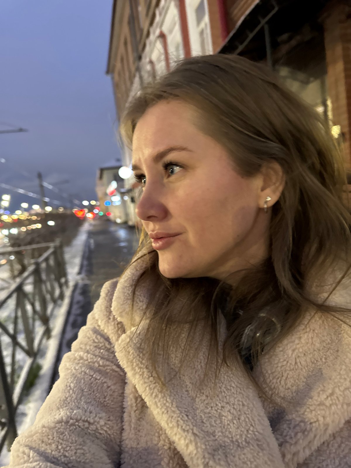 Young woman photographed in multiple selfies across Perm, Russia