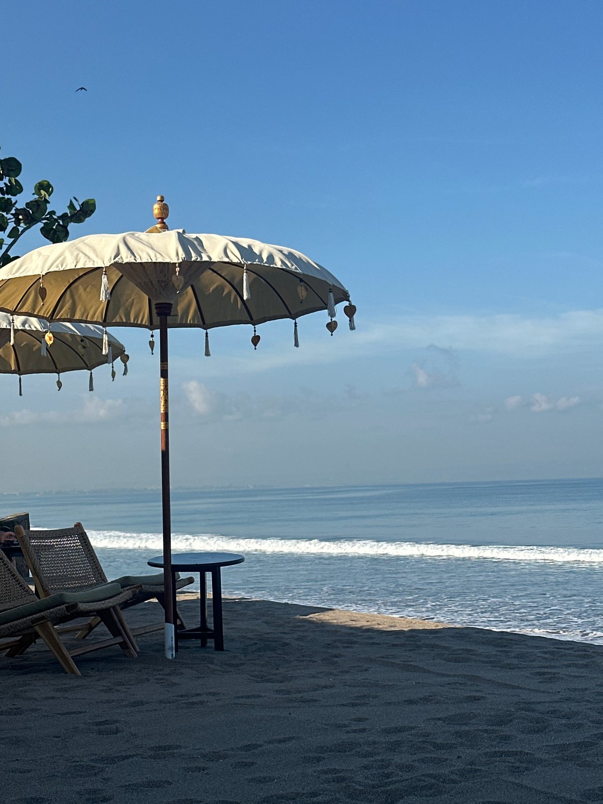 Woman and baby enjoy beach time in North Kuta