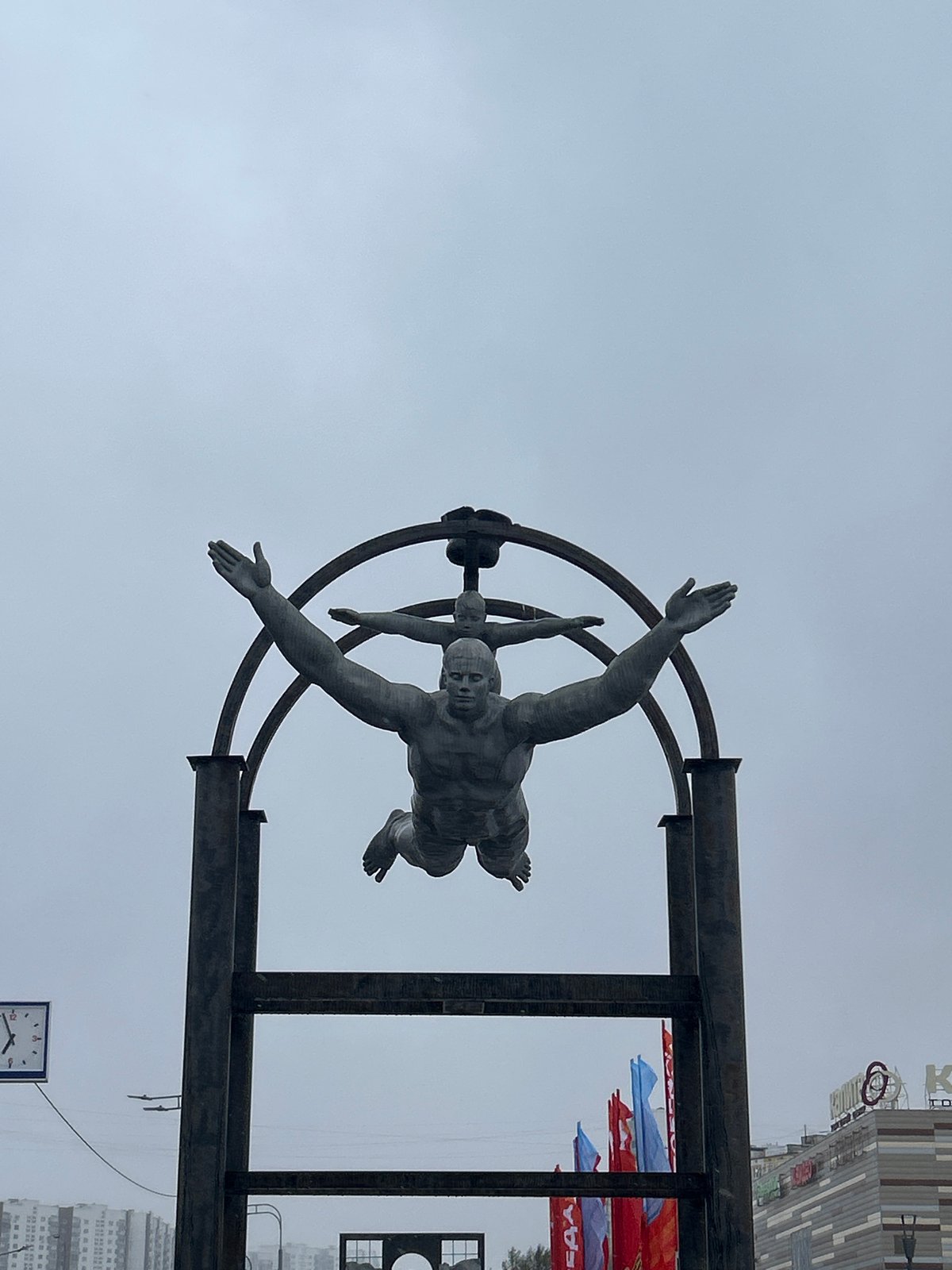 Dark monument photographed against overcast sky in Moscow