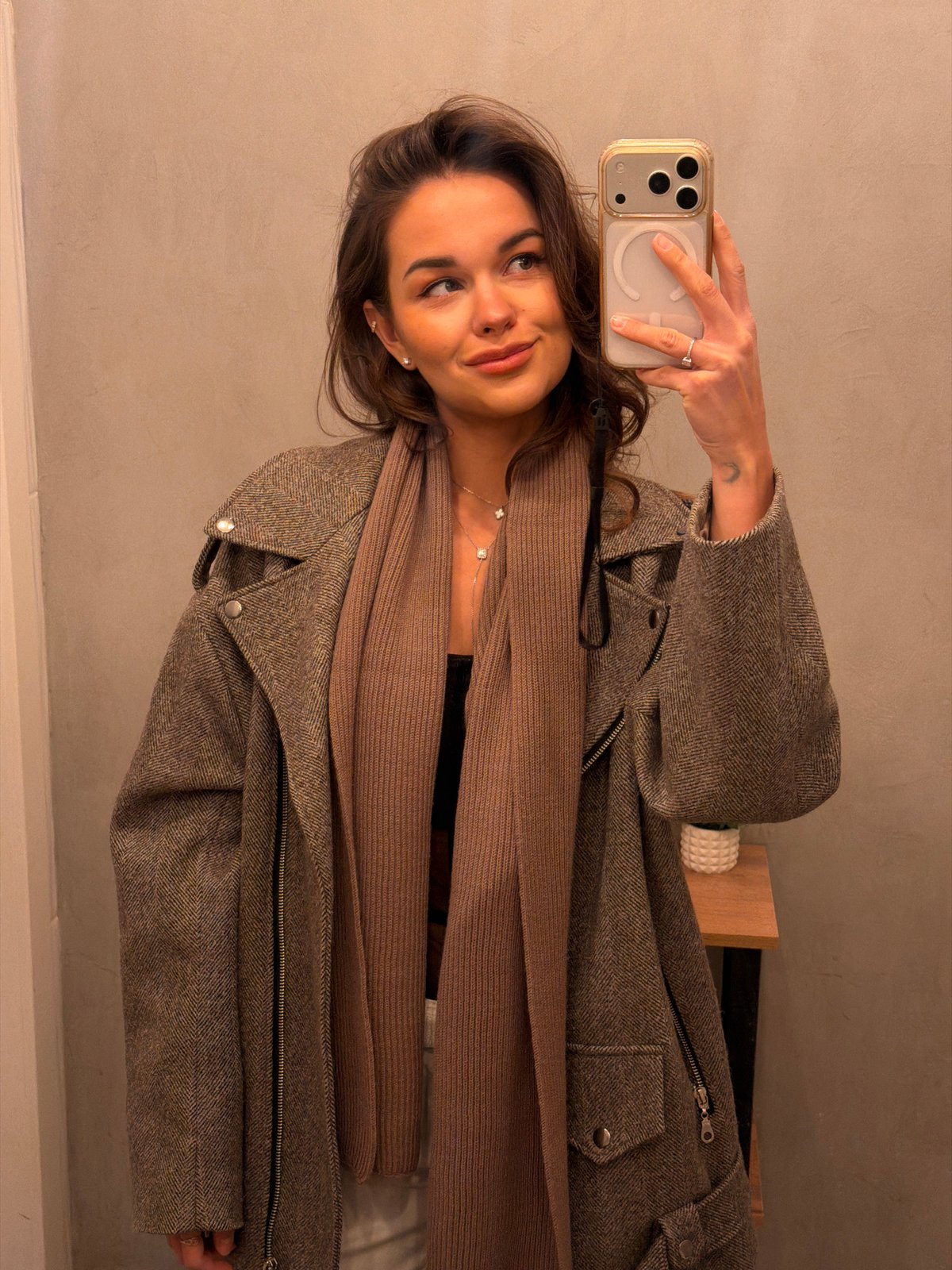 Woman takes indoor selfies in Krasnoyarsk home