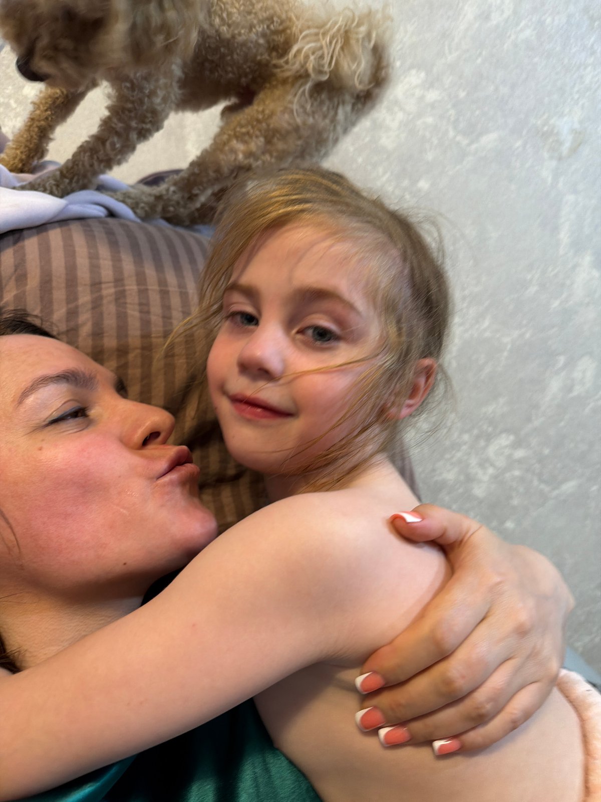 Lazy afternoon at home with a poodle, a cat, and kids
